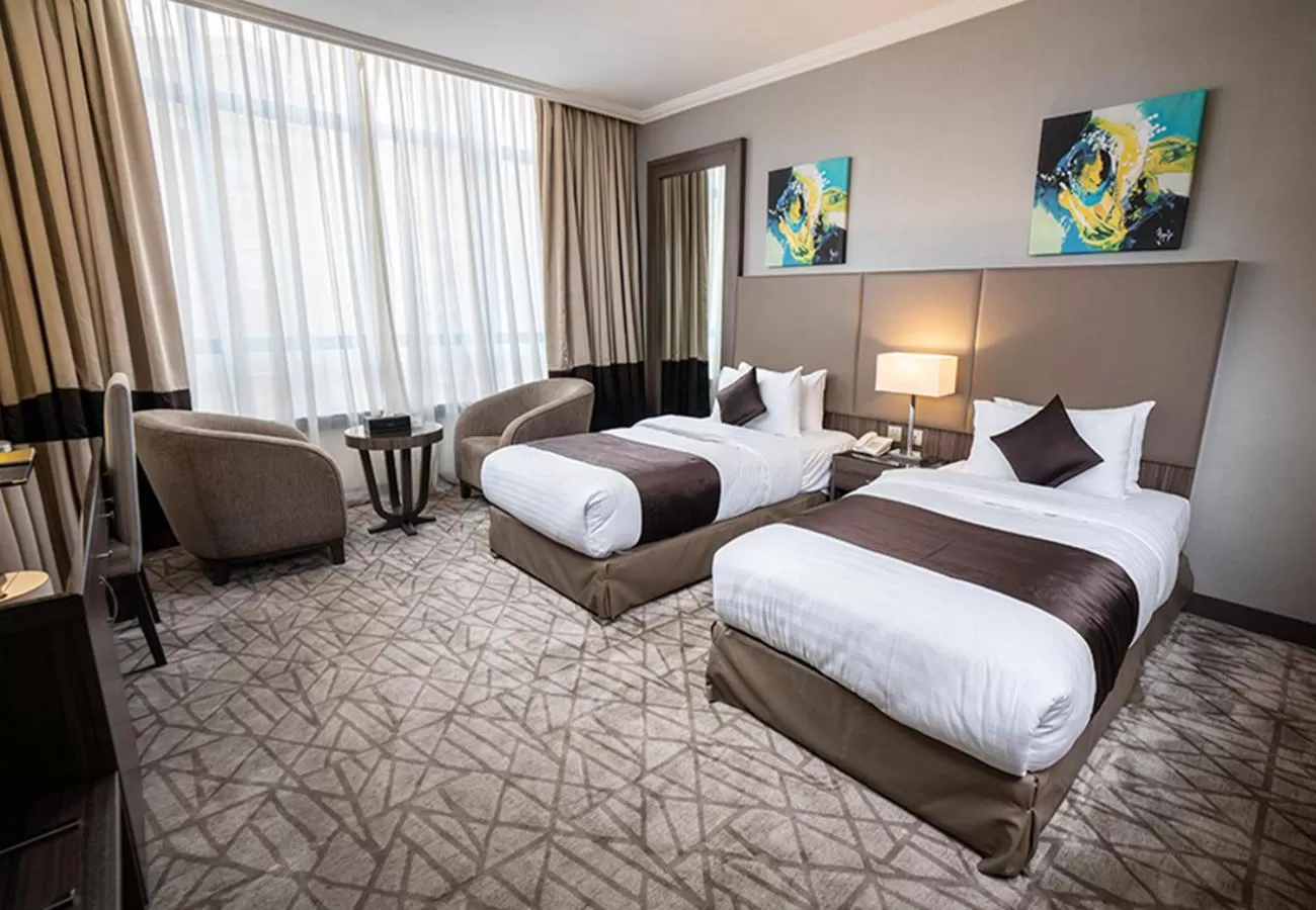 Photo of the whole room in Aquila Al Hamra Hotel