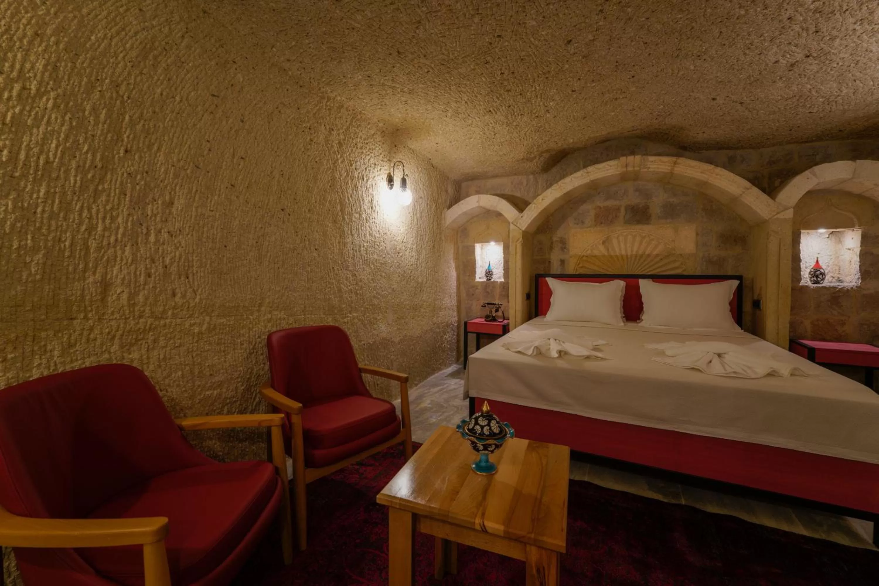 Bed in The Niche Cave Hotel