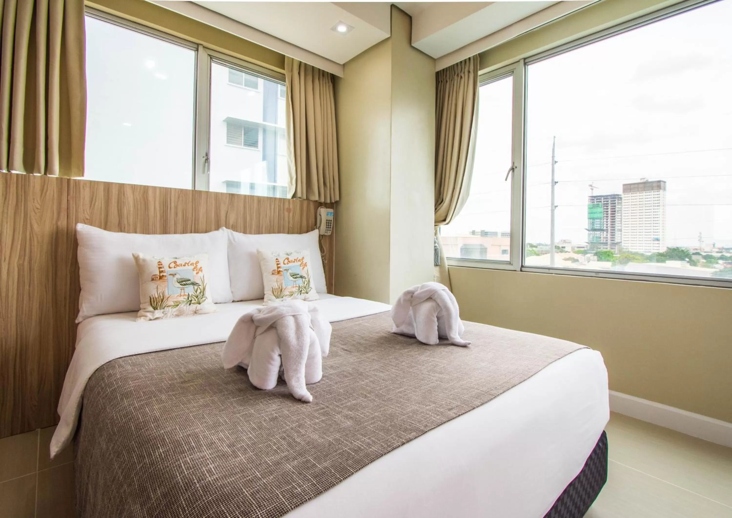 Bed in Alicia Apartelle