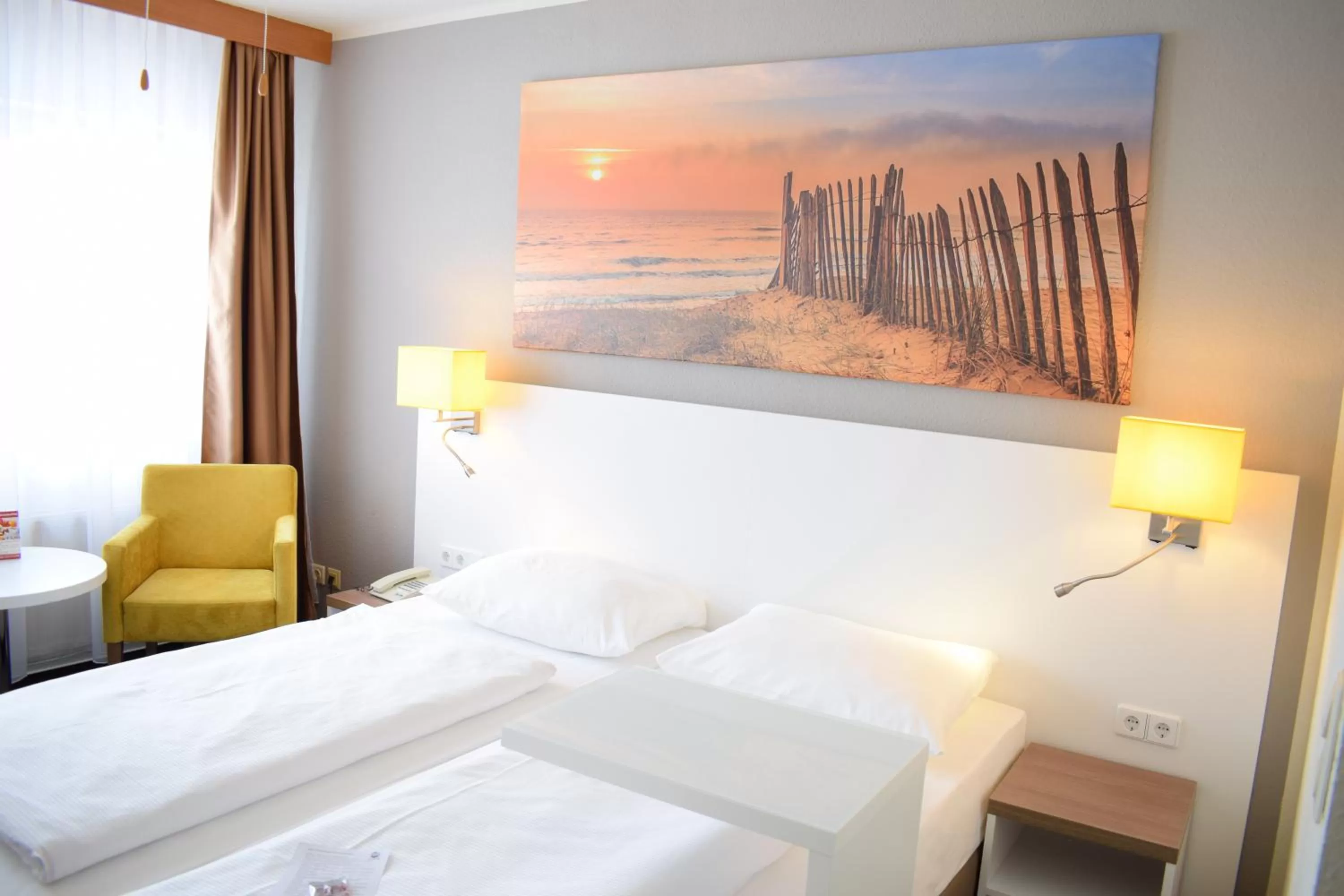 Photo of the whole room, Bed in astral'Inn Leipzig Hotel & Restaurant