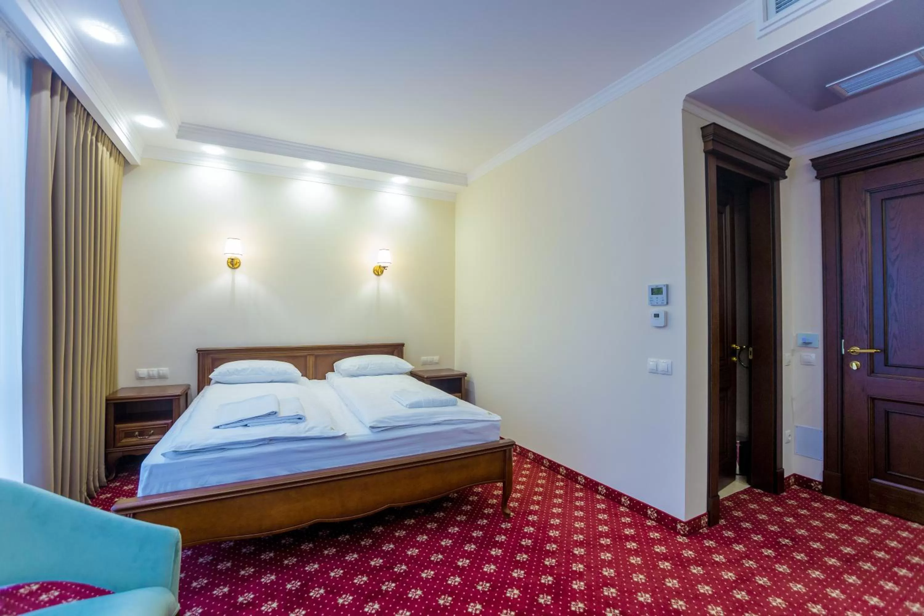 Photo of the whole room, Bed in Ambassador Hotel