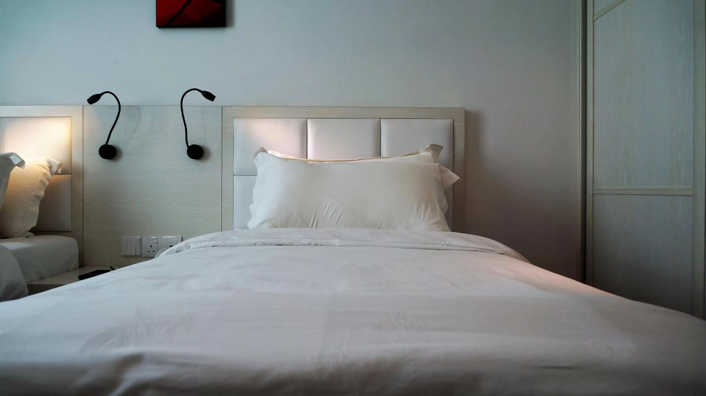 Bed in Pine Garden Hotel