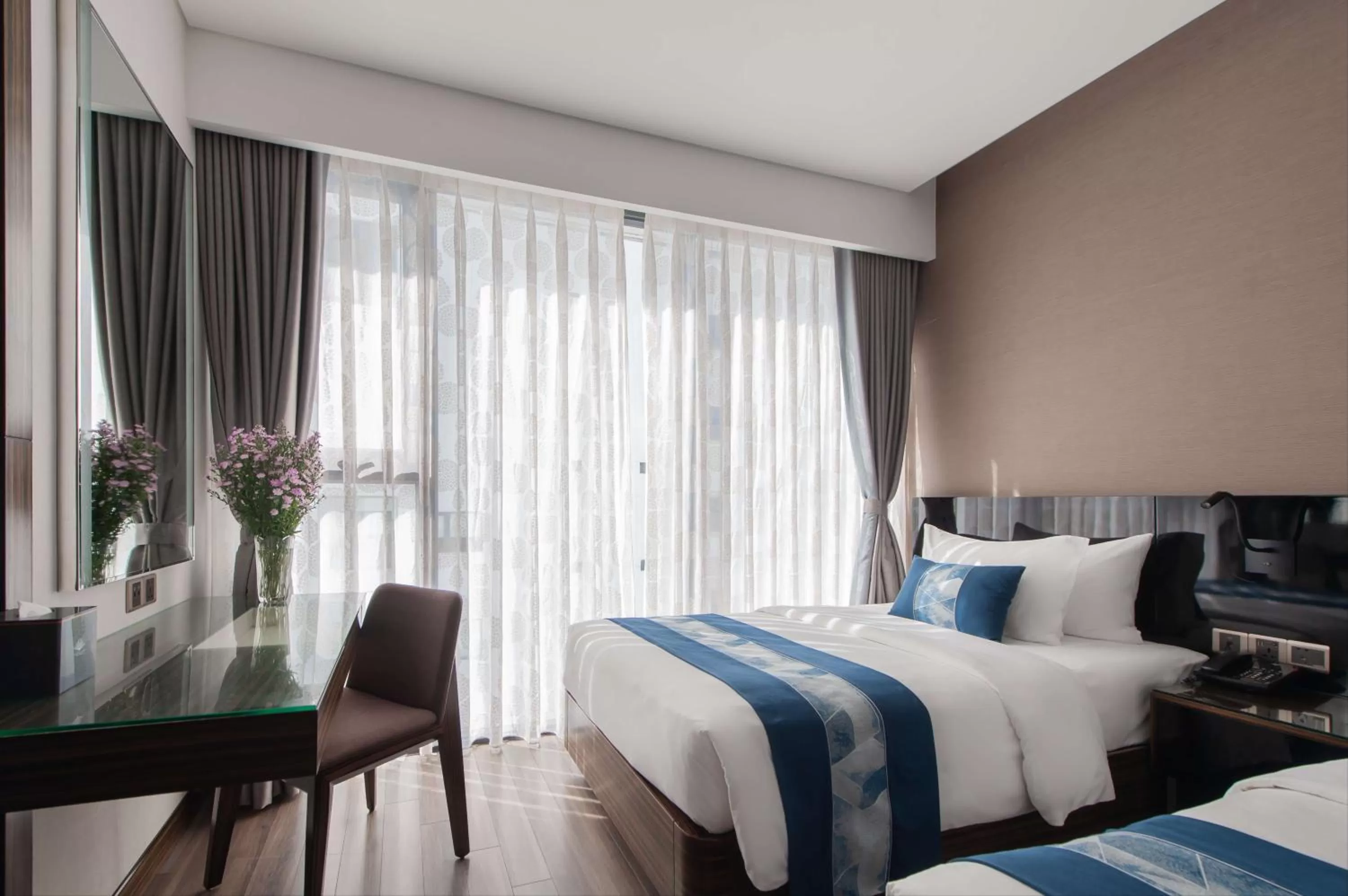 Bed in Queen Ann Nha Trang Hotel