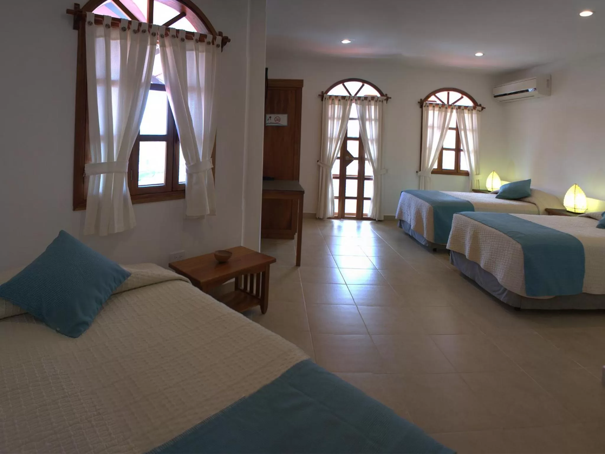 Bedroom, Bed in Hotel Galapagos Suites B&B