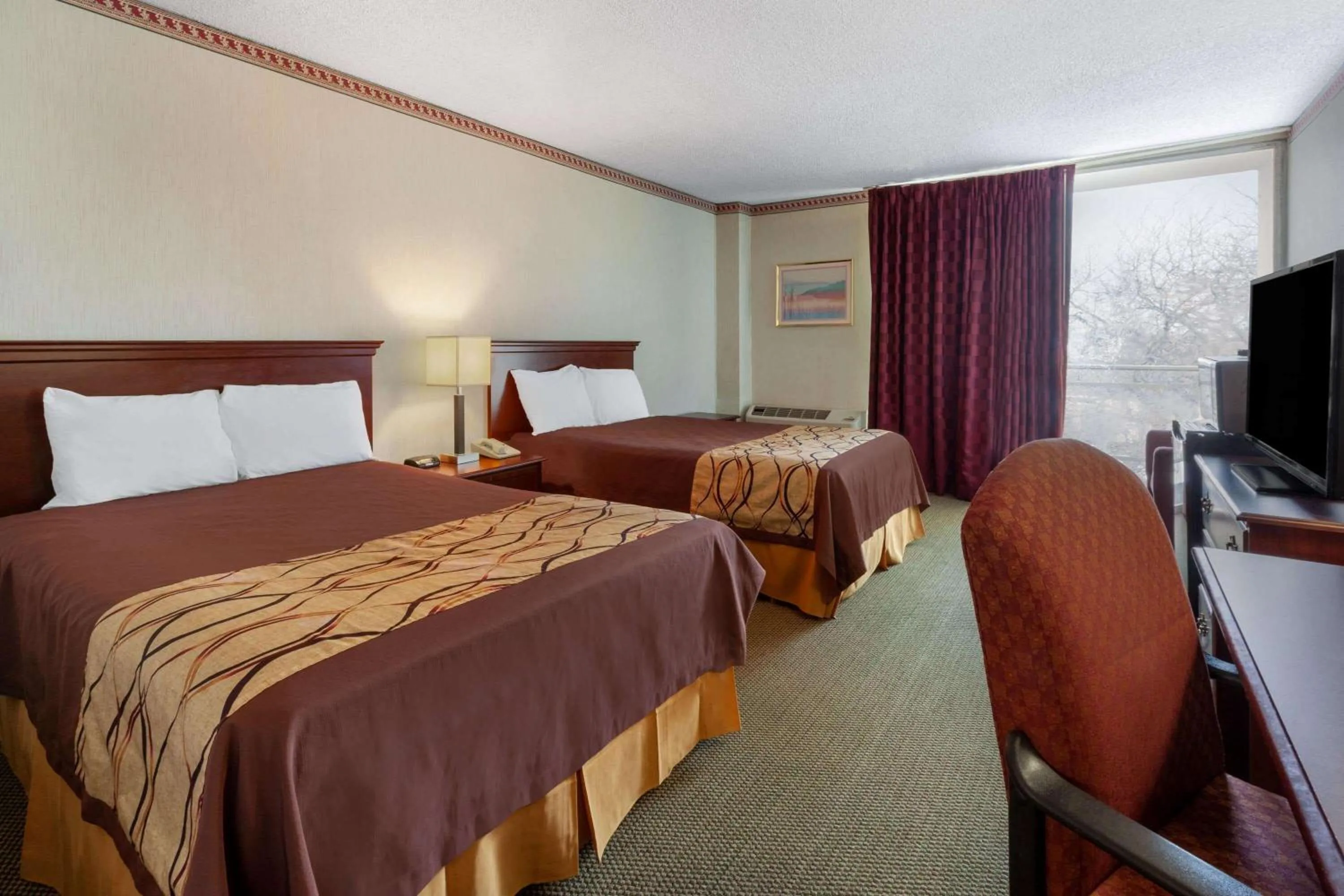 Photo of the whole room, Bed in Travelodge by Wyndham Cleveland Airport