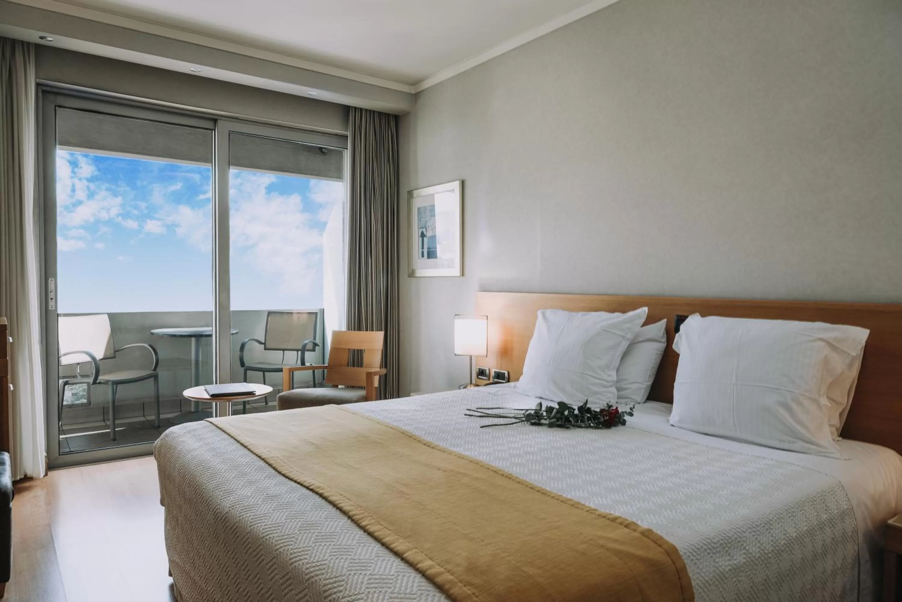 Bed in The Athenian Callirhoe Exclusive Hotel