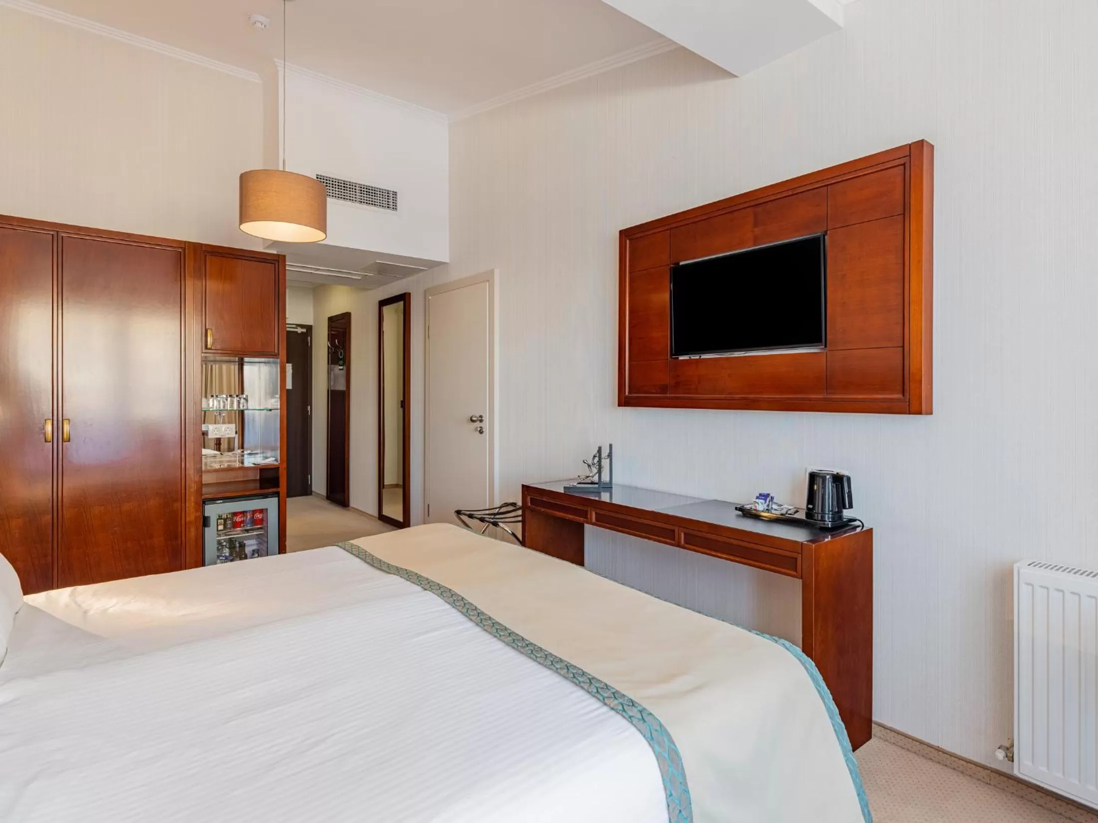 Bed in Concorde Old Bucharest Hotel