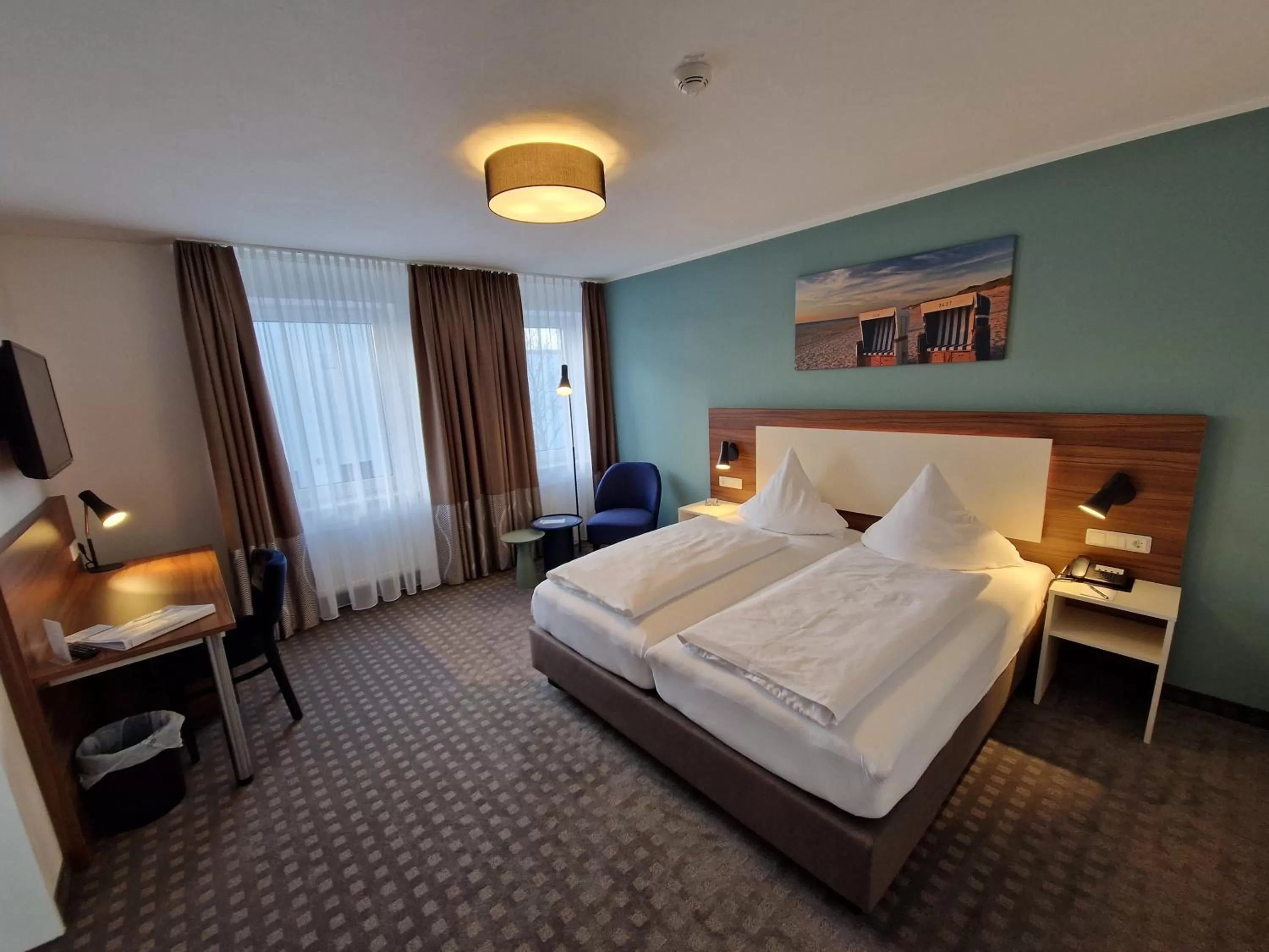 Photo of the whole room, Bed in Hotel Friesische Wehde