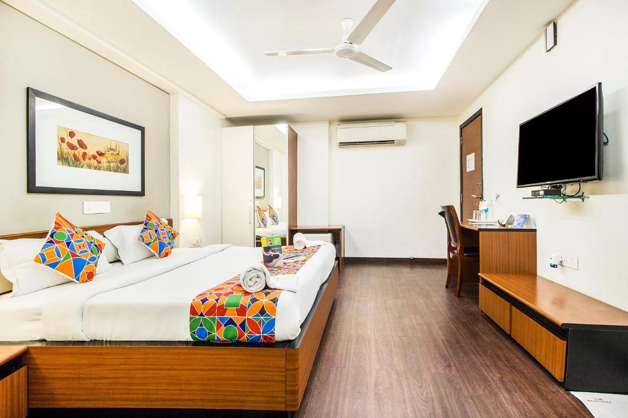 Bed in FabHotel Prime Avenue