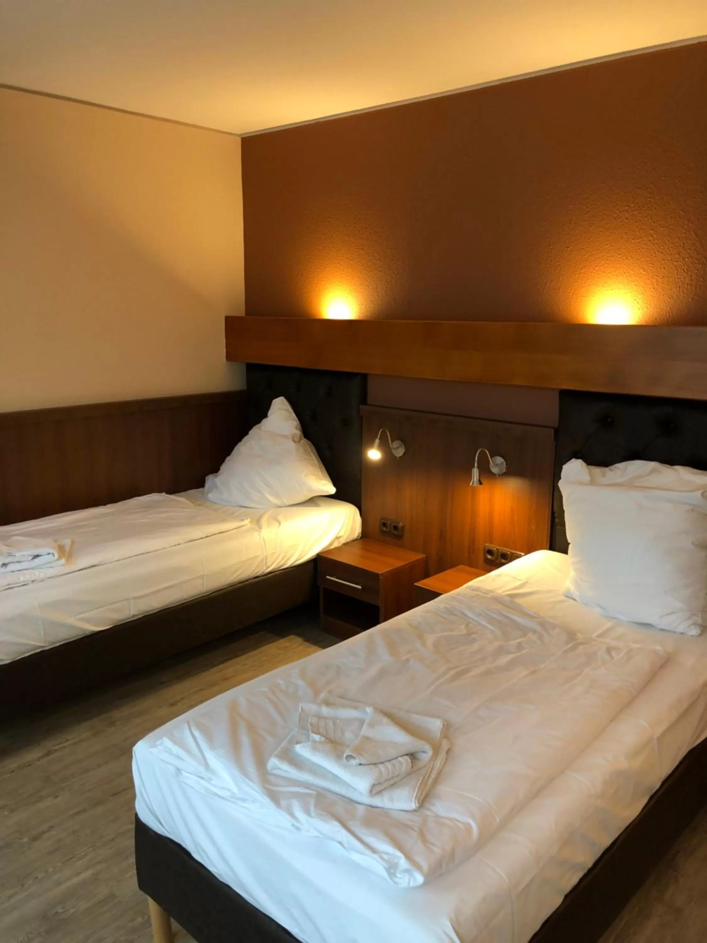 Bed in Hotel Poseidon