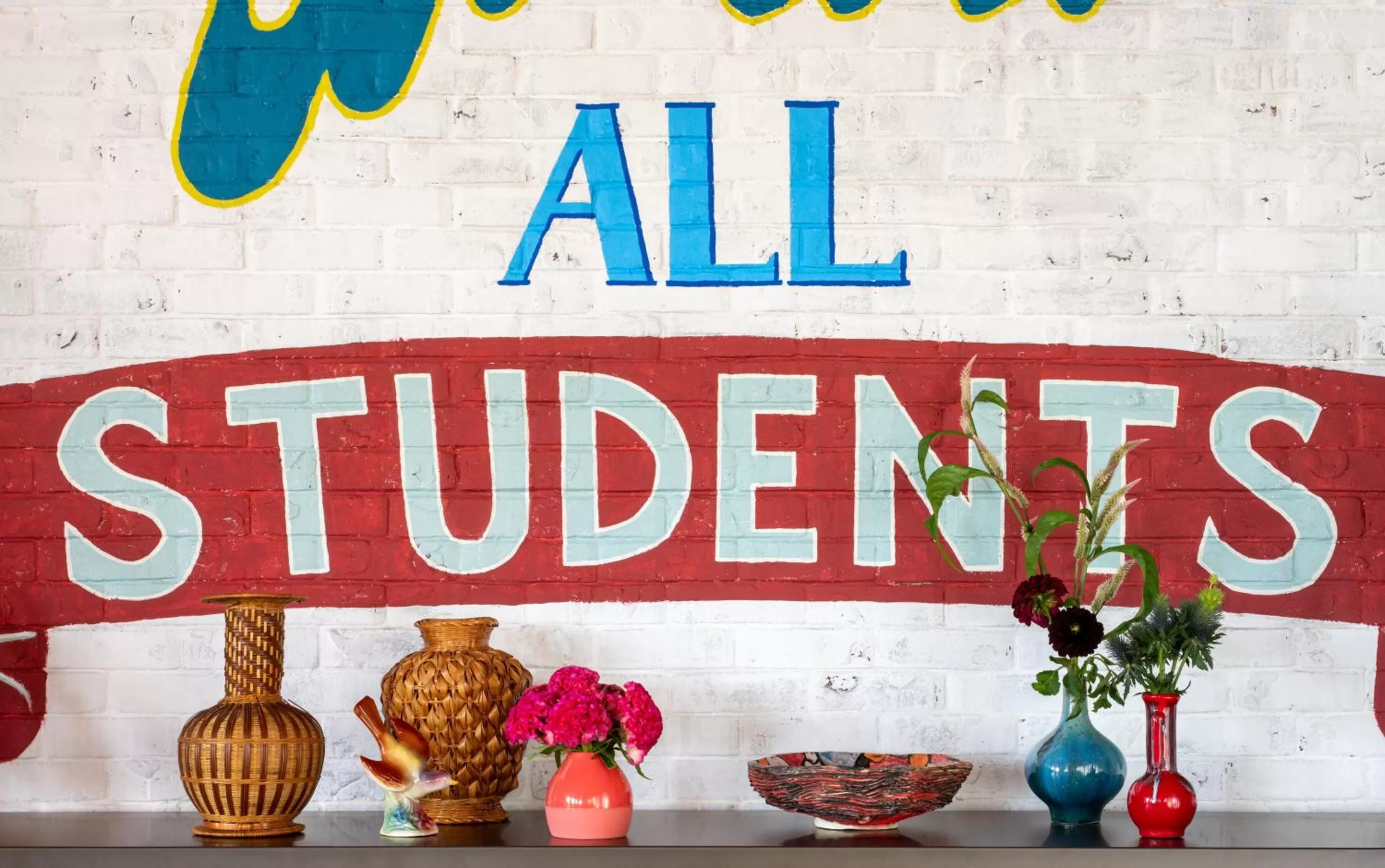 Property logo or sign in Graduate by Hilton Fayetteville, AR