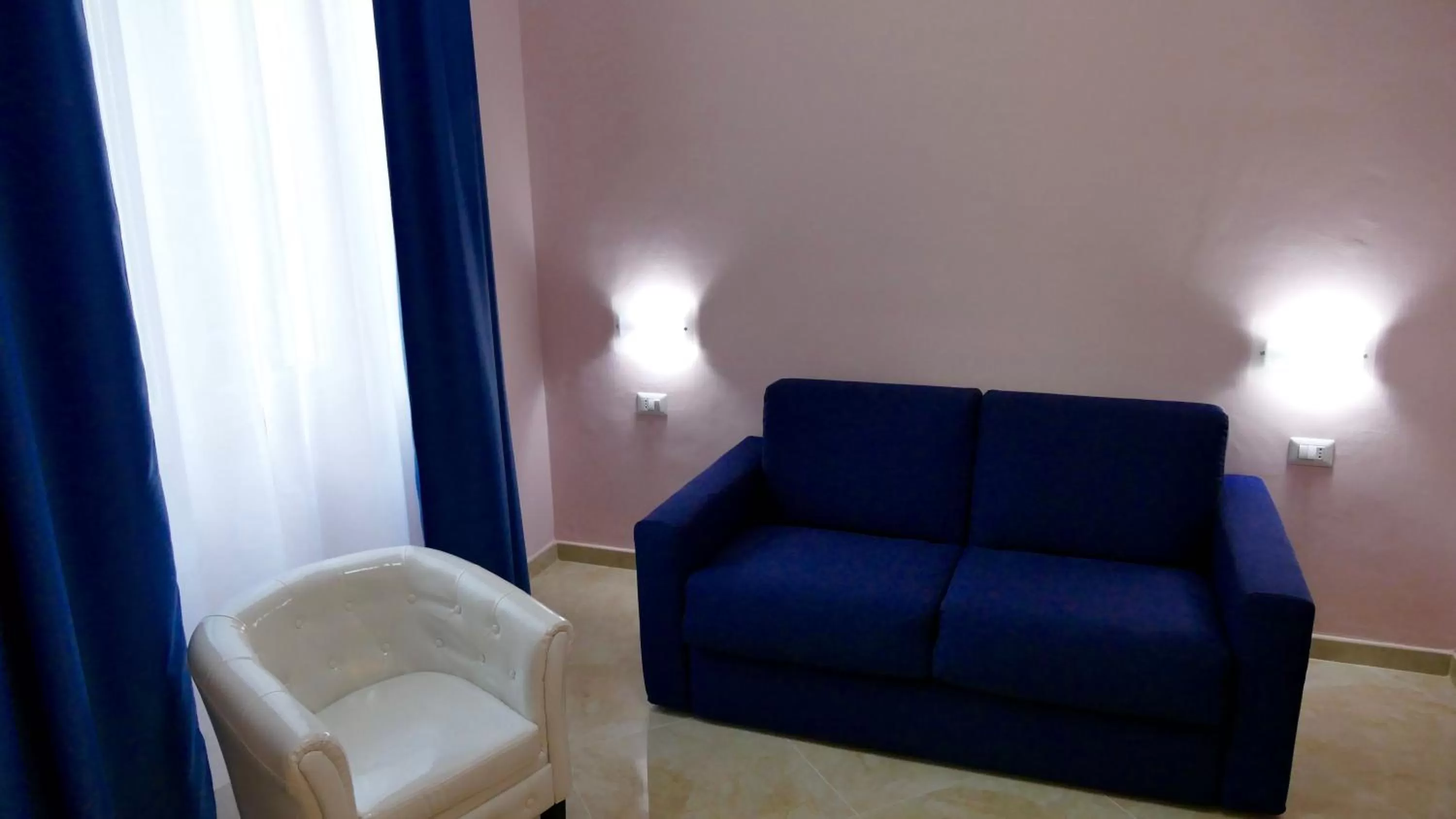 Living room in Cairoli Exclusive Rooms & Suite