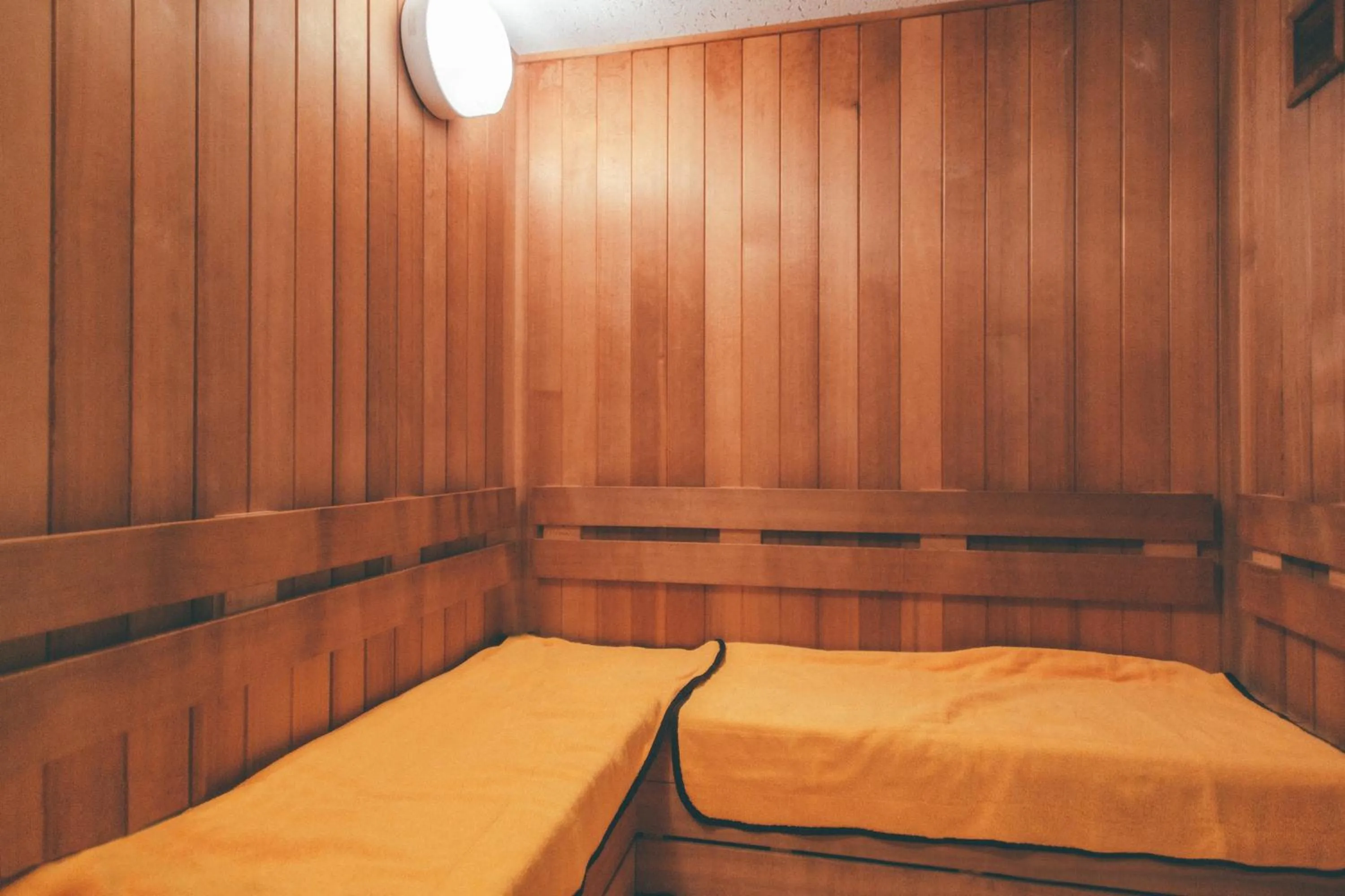 Bed in Hotel Kuretakeso Takayama Ekimae