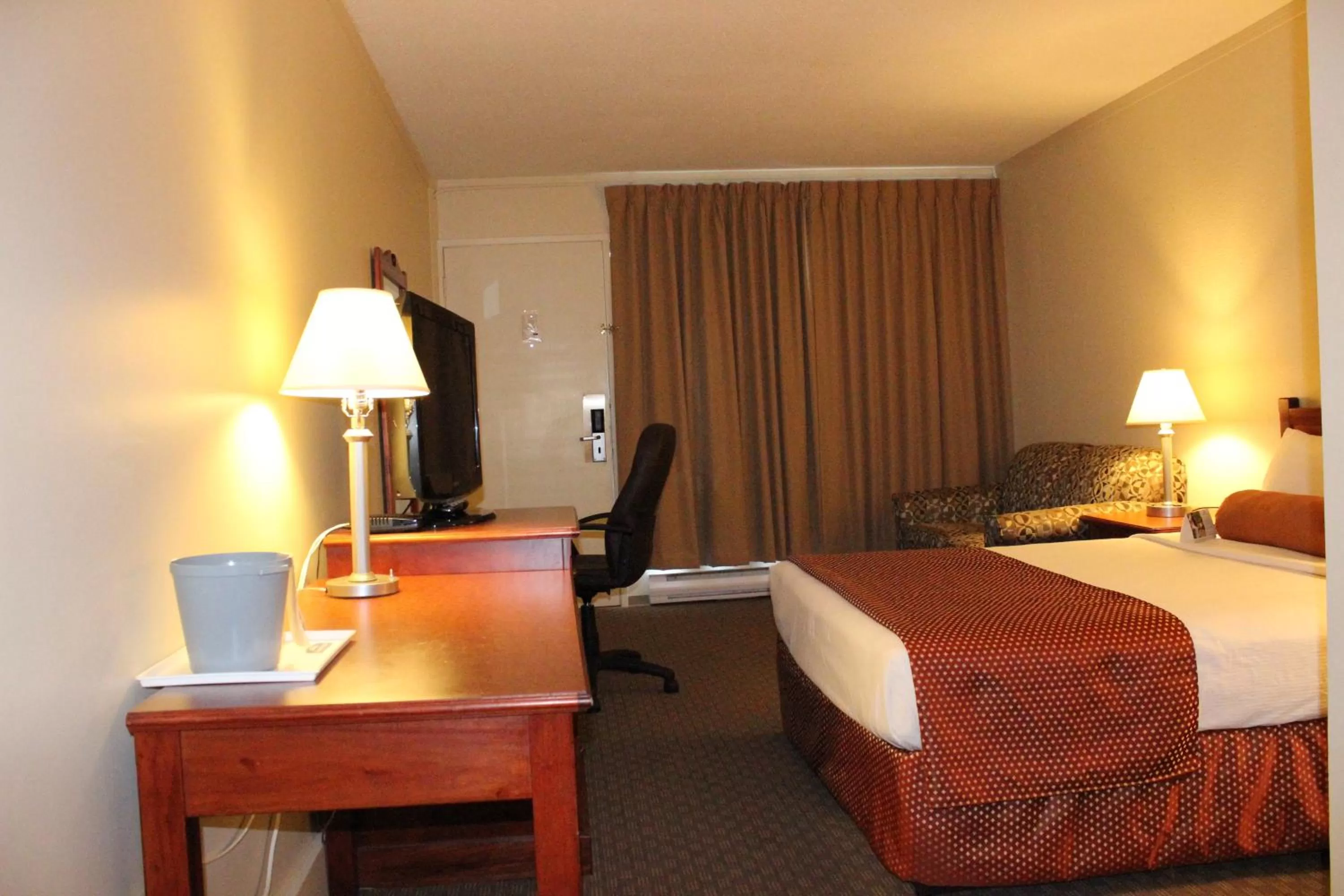 Bed in Knights Inn Lethbridge