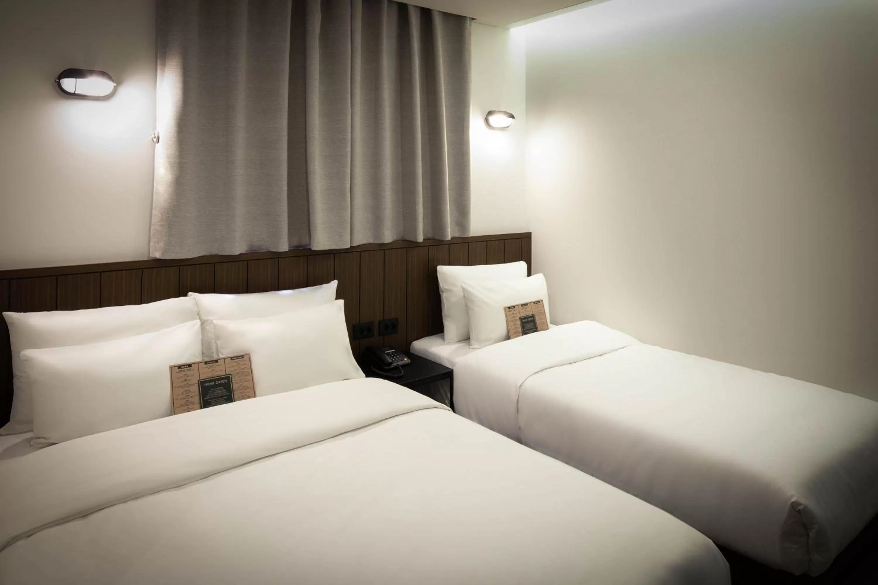 Bed in Hotel Lumia Myeongdong