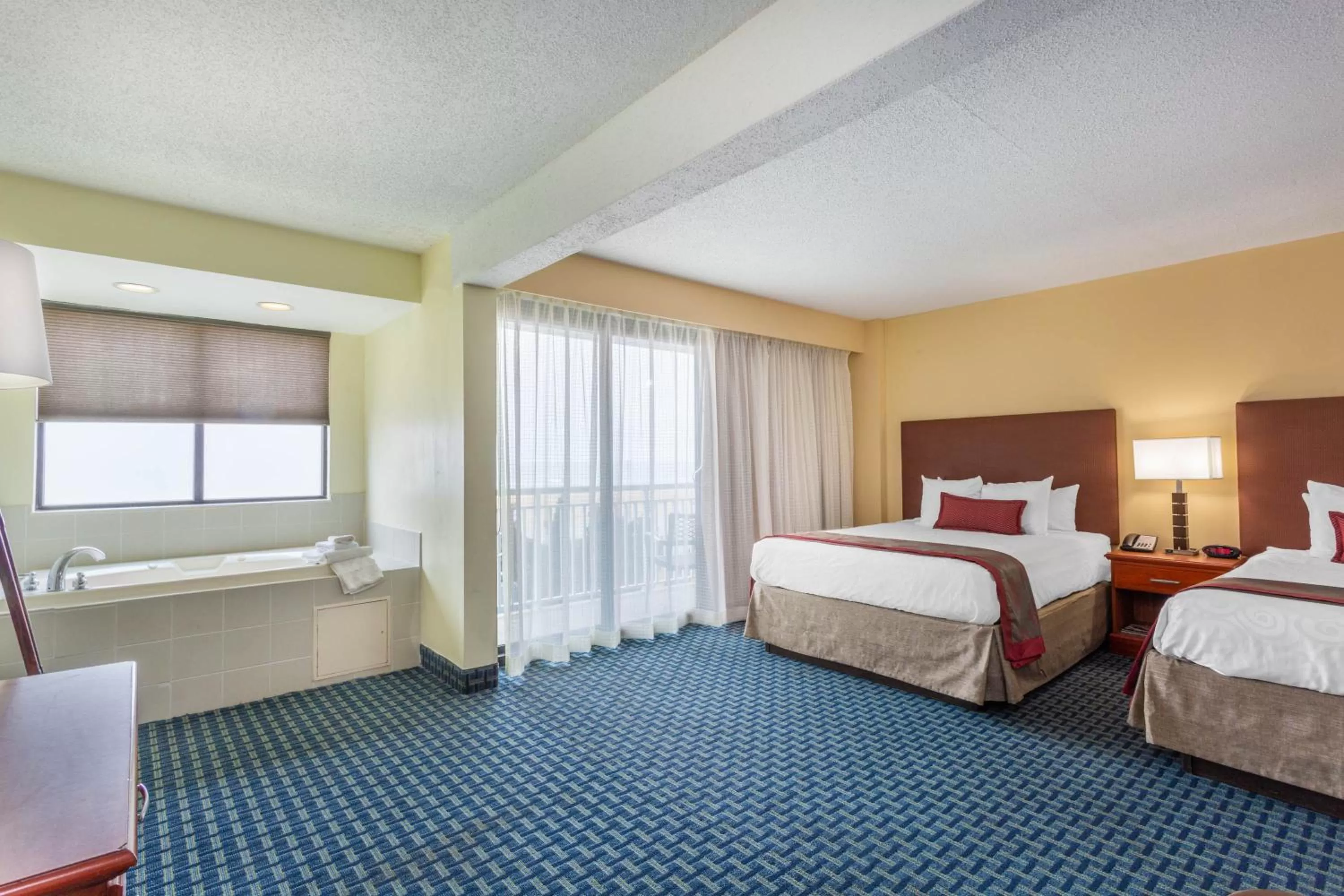 Hot Tub, Bed in Ramada Plaza by Wyndham Virginia Beach Oceanfront