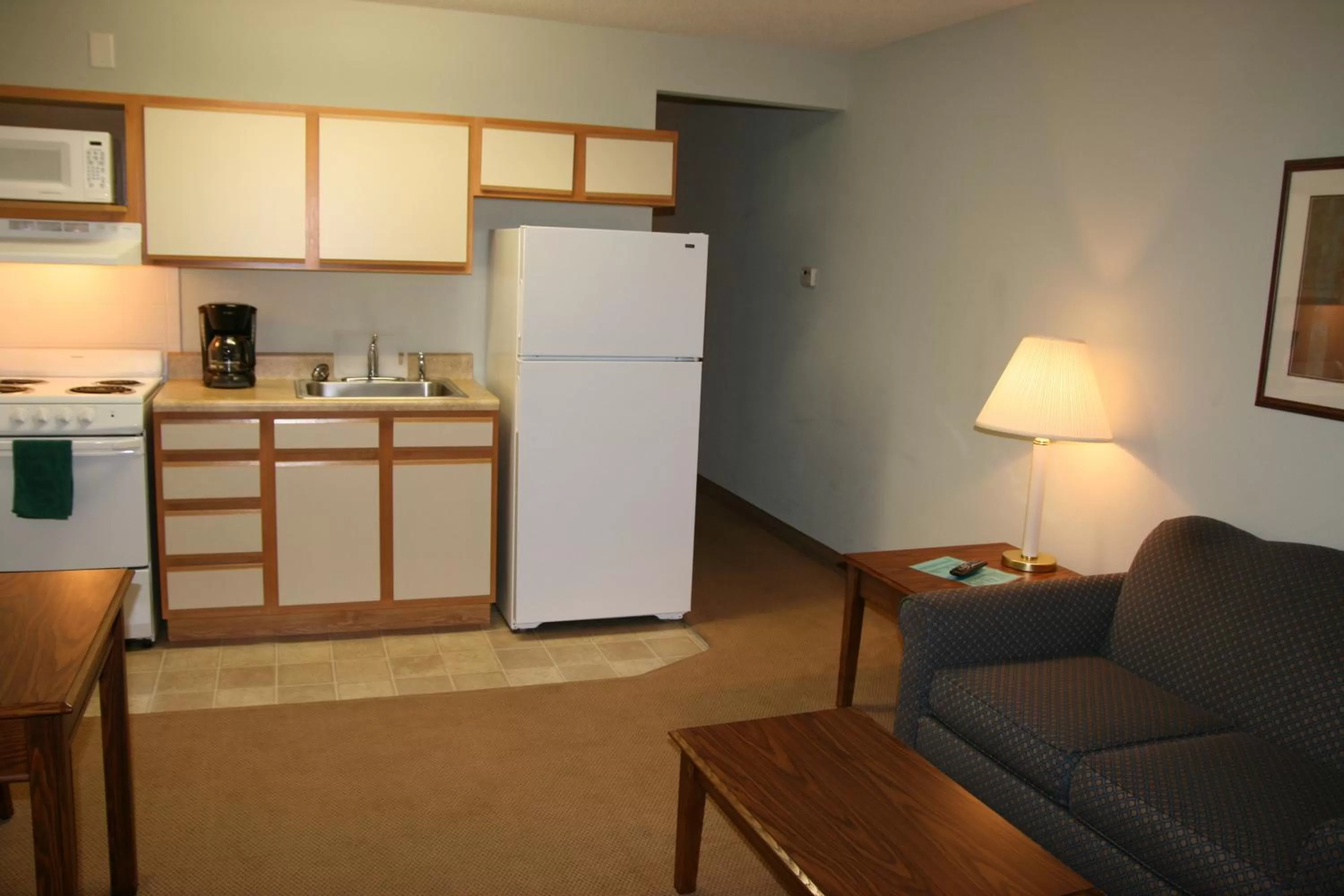 Kitchen or kitchenette in Affordable Suites Jacksonville