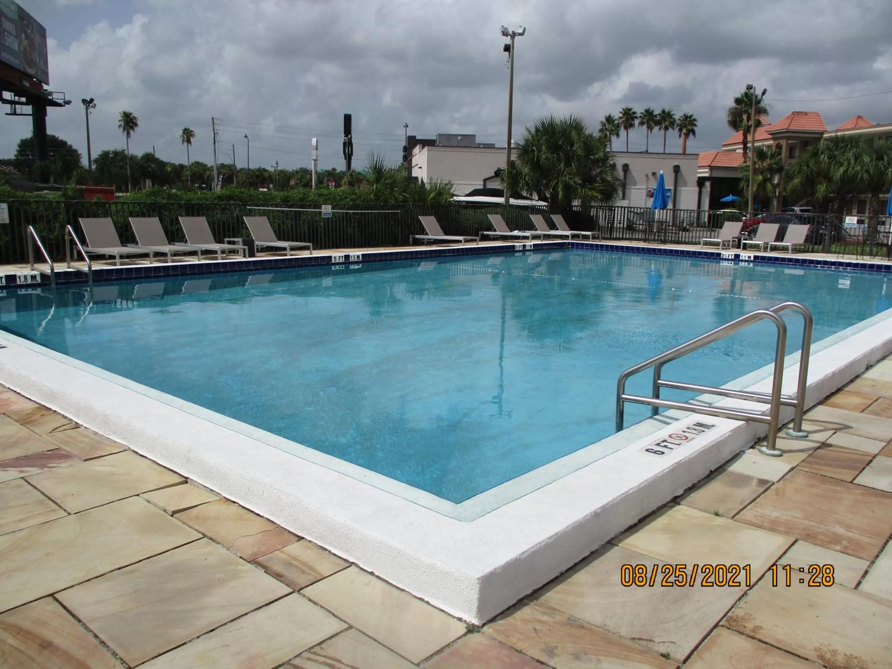 Swimming pool in Quality Inn & Suites Kissimmee by The Lake