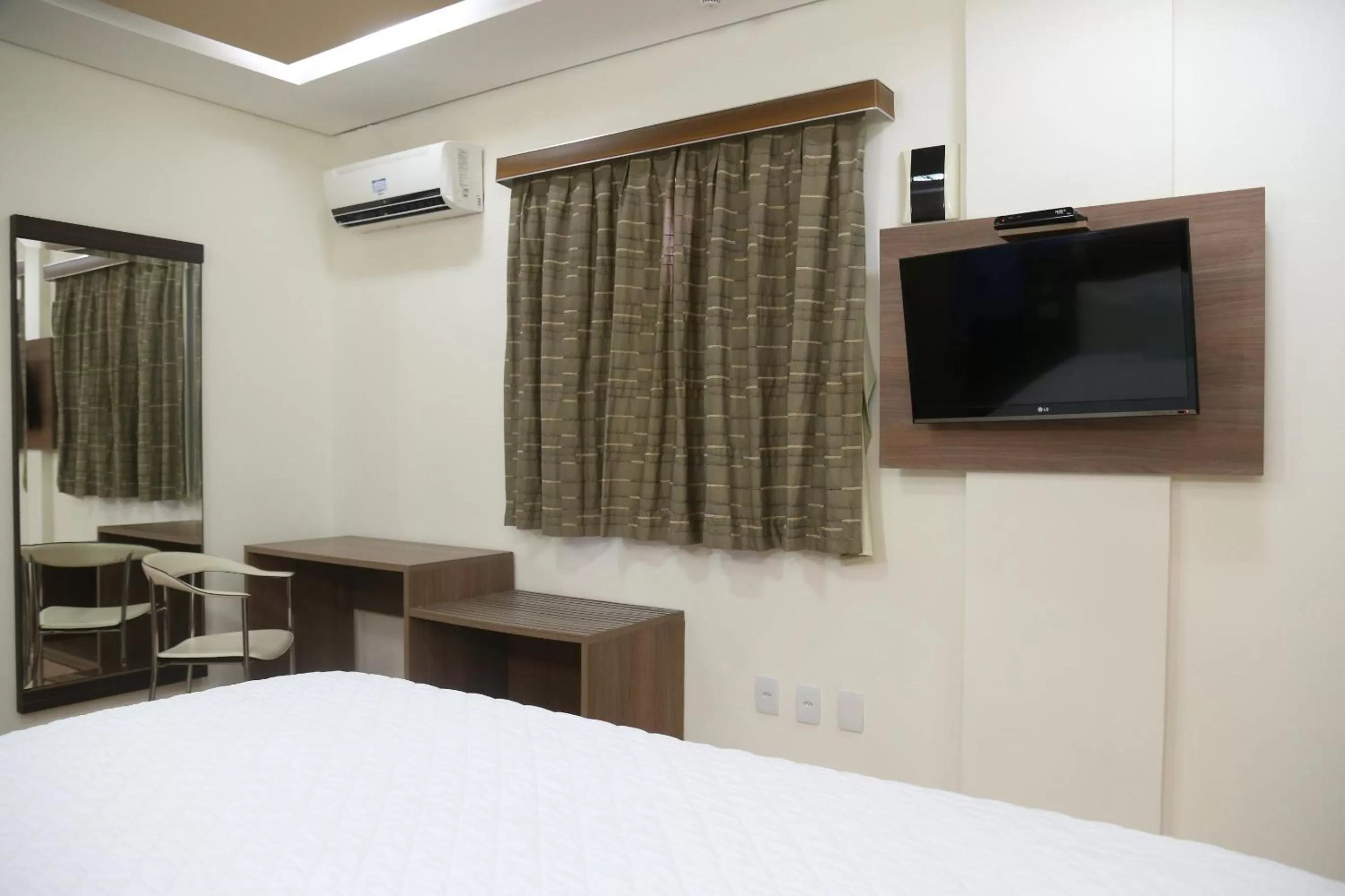 Bed in Larison Executive - by Easy Hotéis