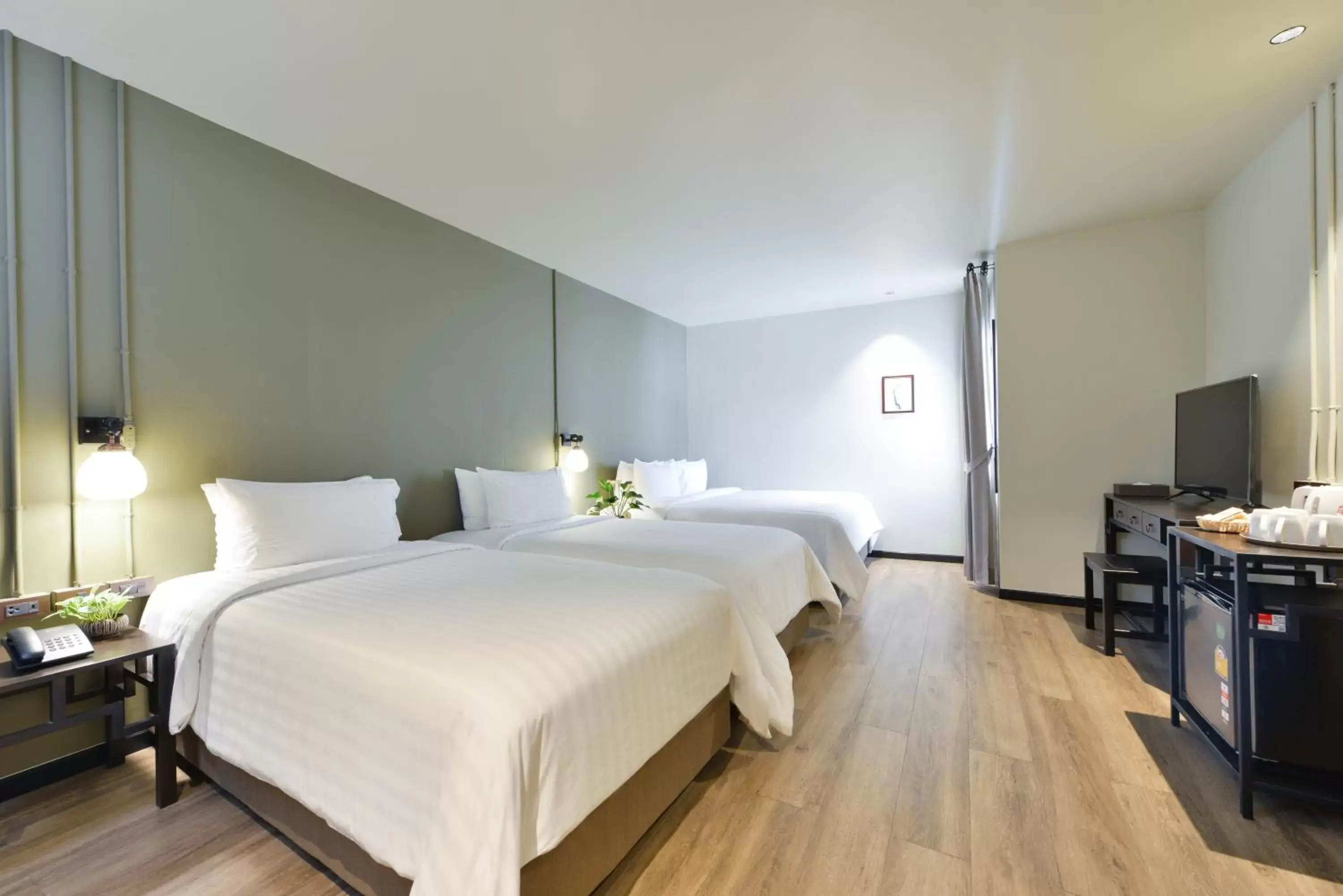 Classic Quadruple Room in Oldthaiheng Hotel Classic Quadruple Room in Oldthaiheng Hotel