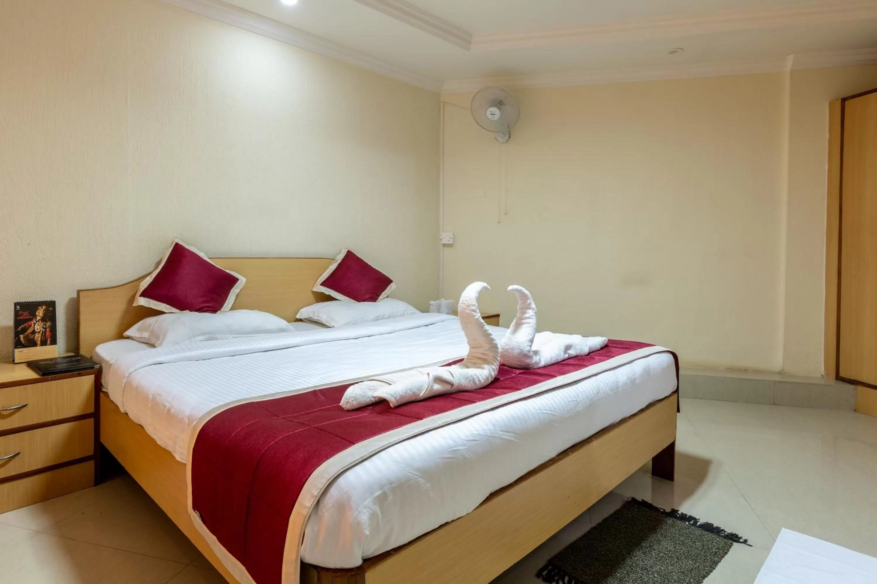 Bed in KSTDC Hotel Mayura Nisarga Pearl Valley