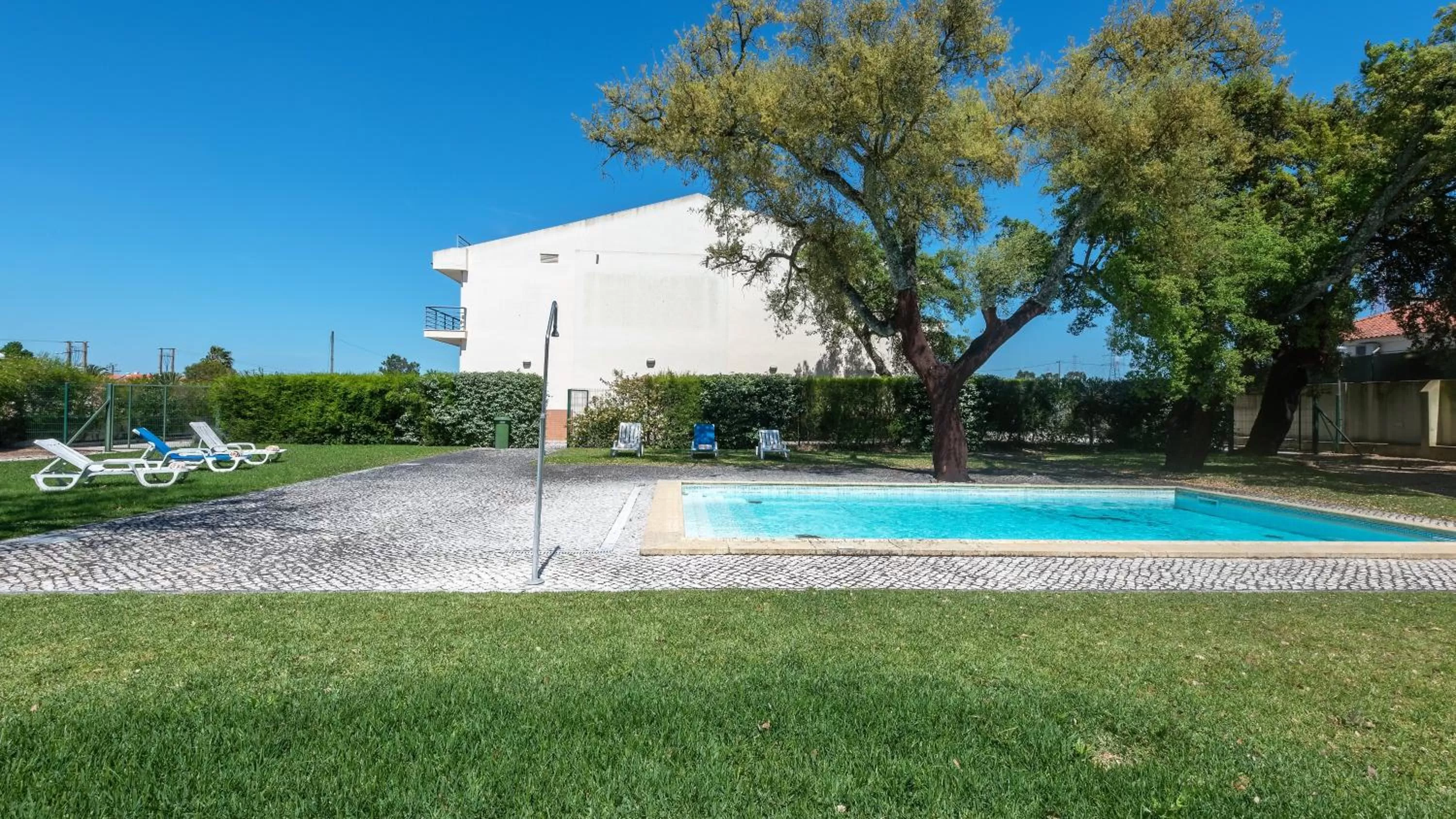 Swimming pool in Amazonia Palmela Apartamentos Turisticos