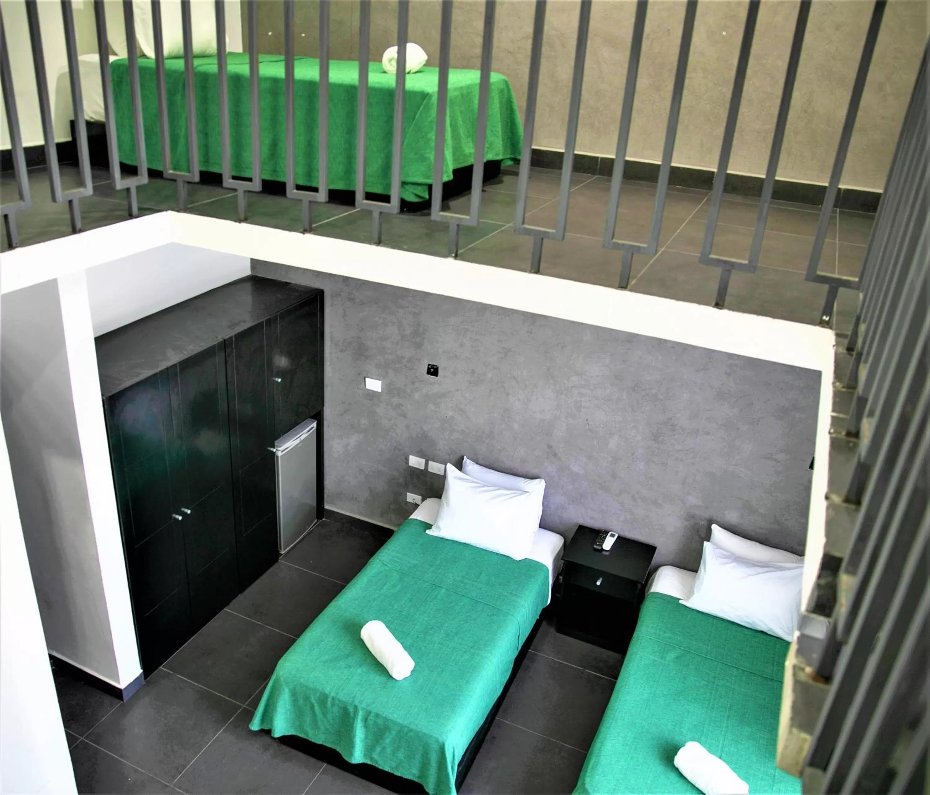 Photo of the whole room, Bed in Hotel Colonial Playa del Carmen