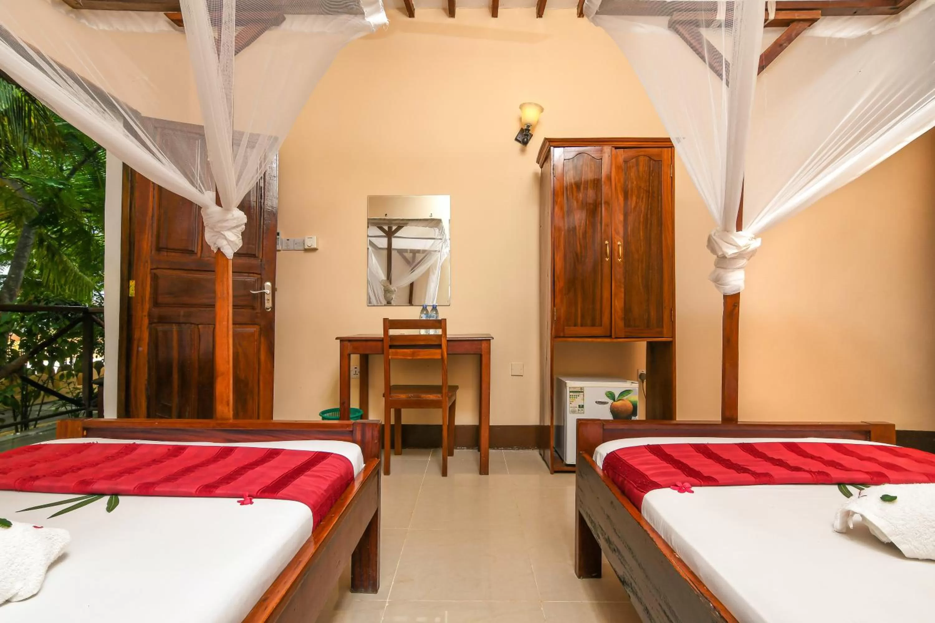 Bed in Amaan Beach Bungalows