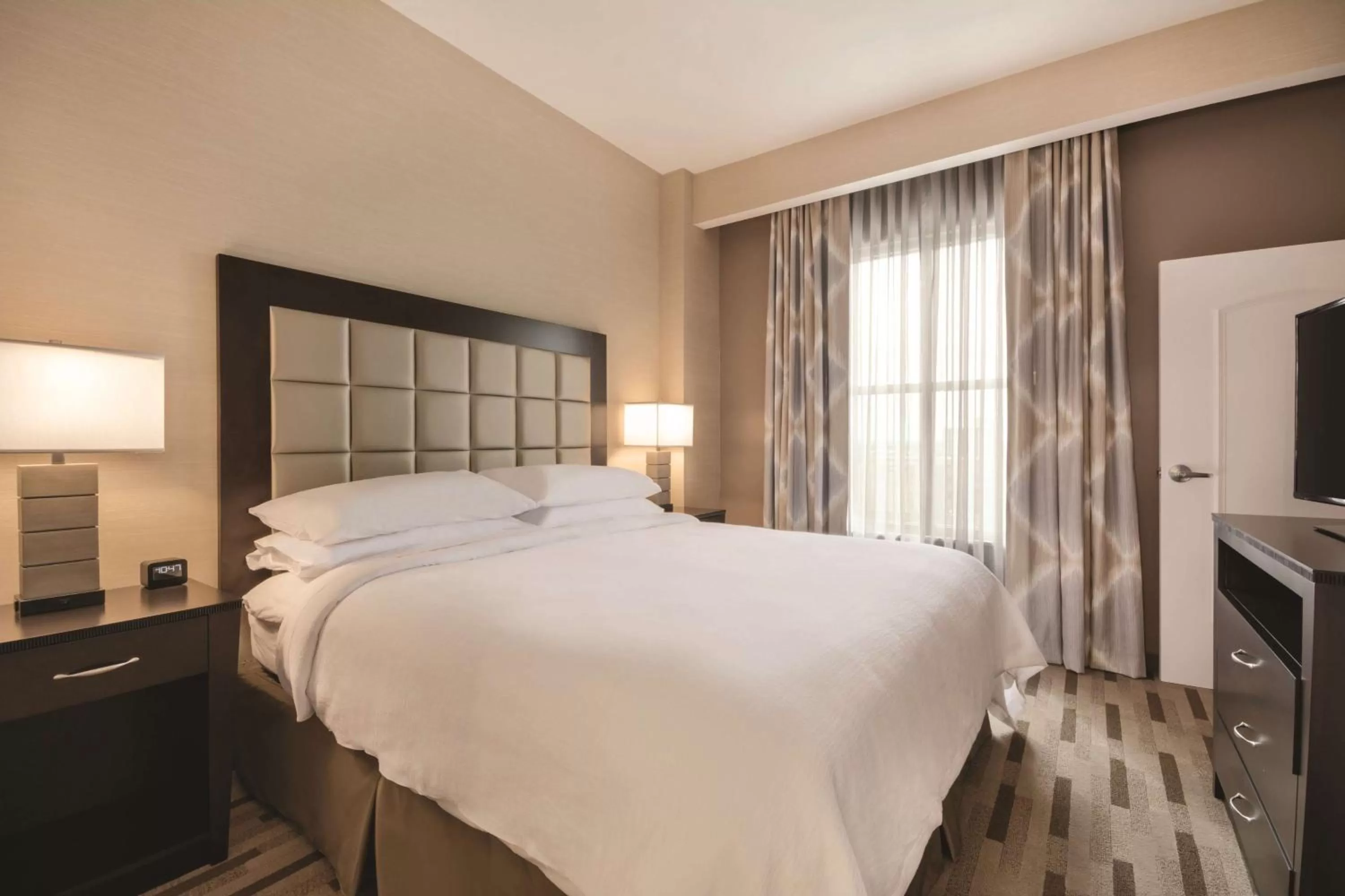 Bed in Embassy Suites by Hilton Tuscaloosa Alabama Downtown