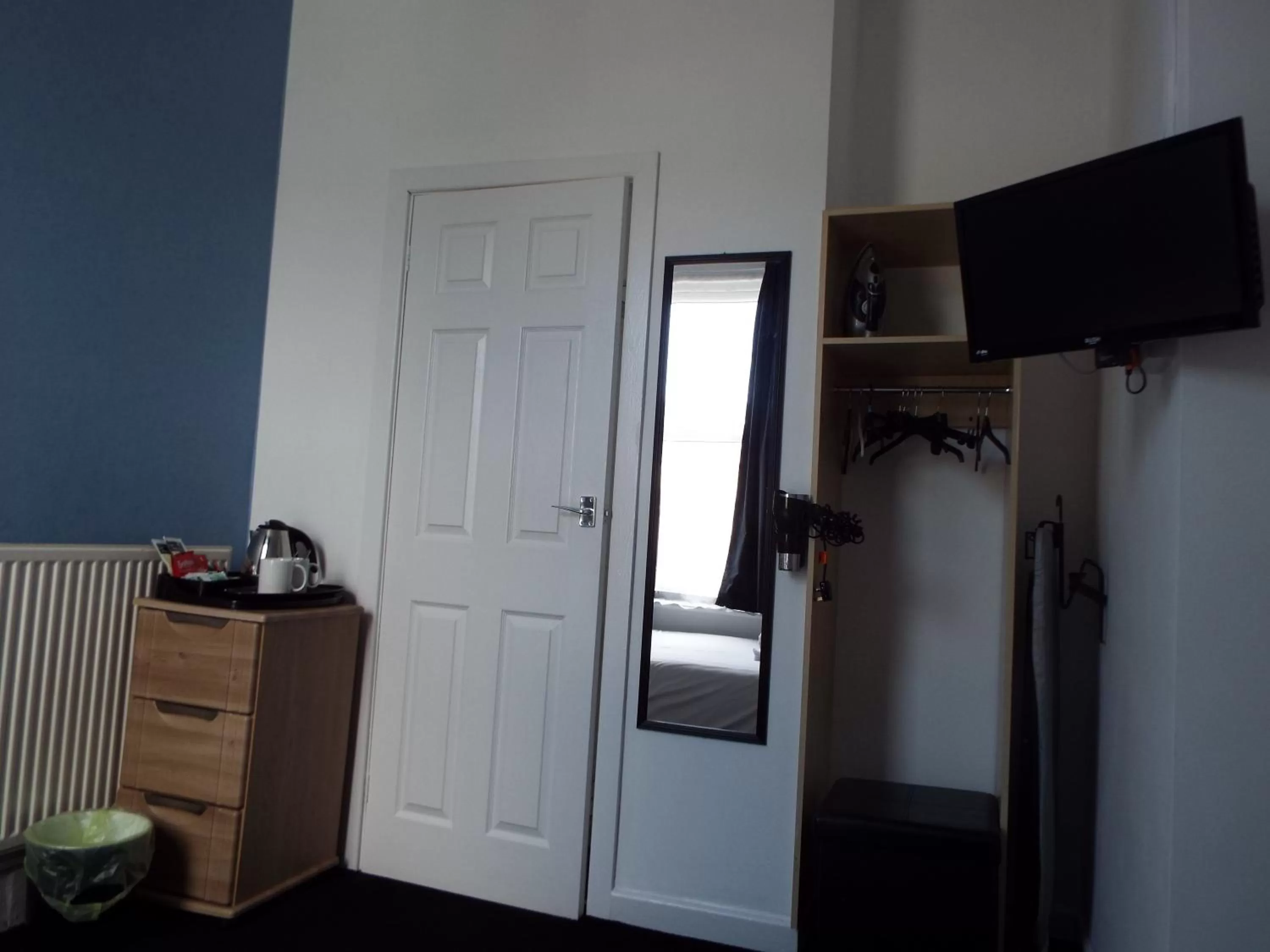 TV/Entertainment Center in Alfies Hotel