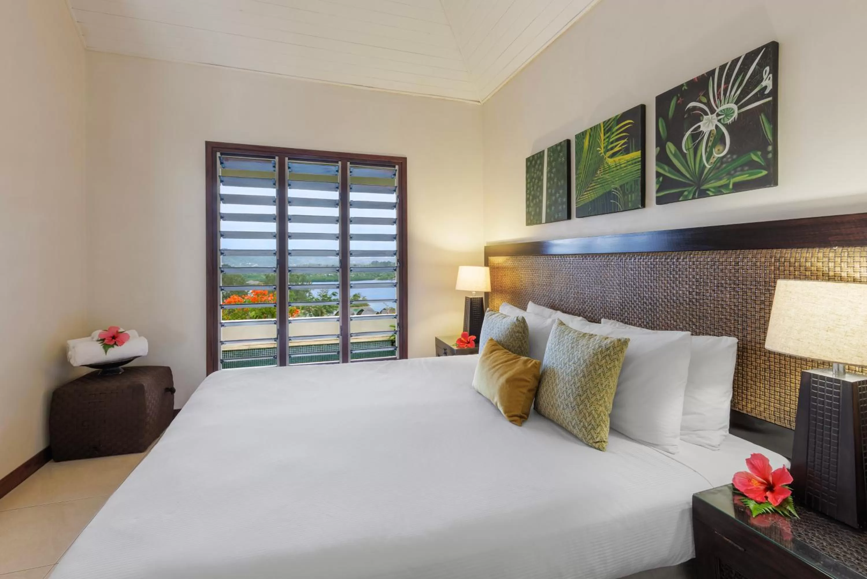 Bed in Mangoes Resort