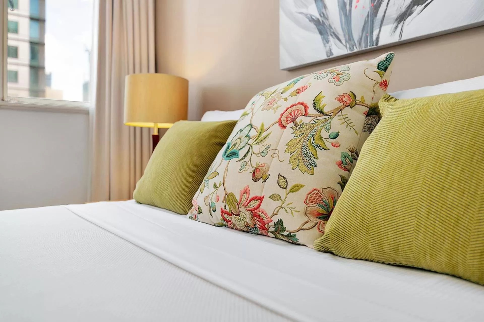 Bed in Manor Apartment Hotel