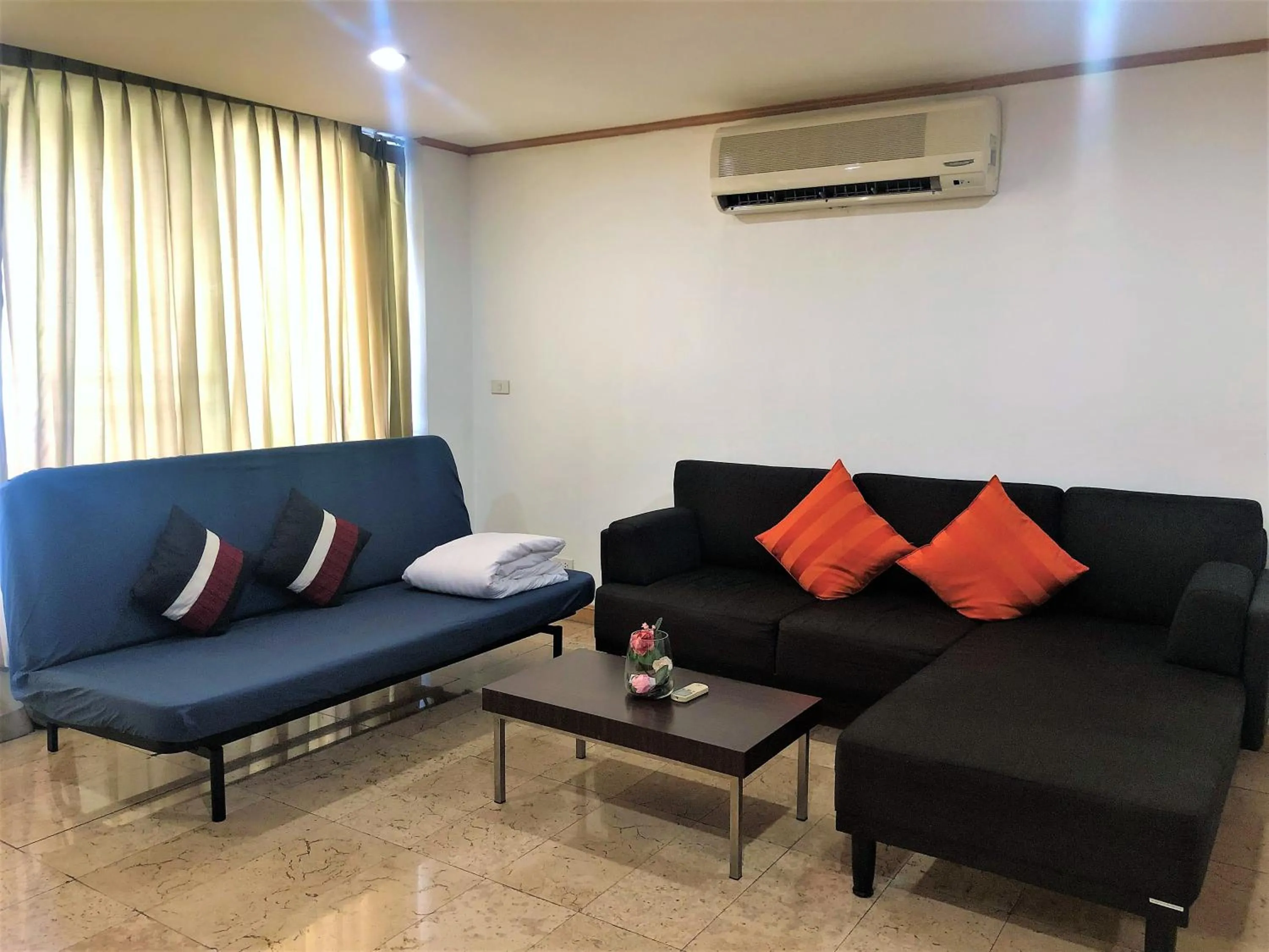 Living room, Seating Area in Twin Peaks Sukhumvit Suites