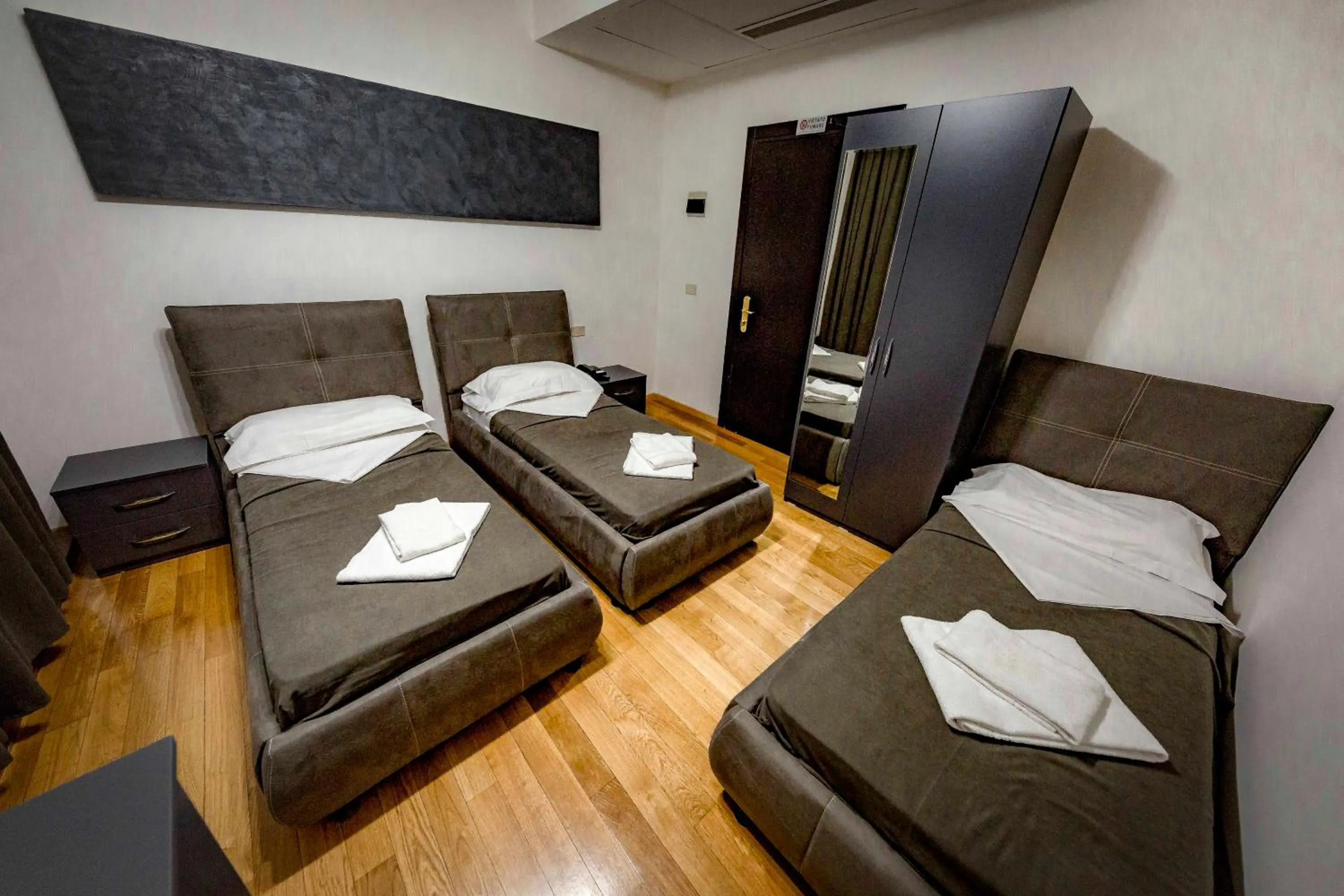 Bed in Hotel Trieste