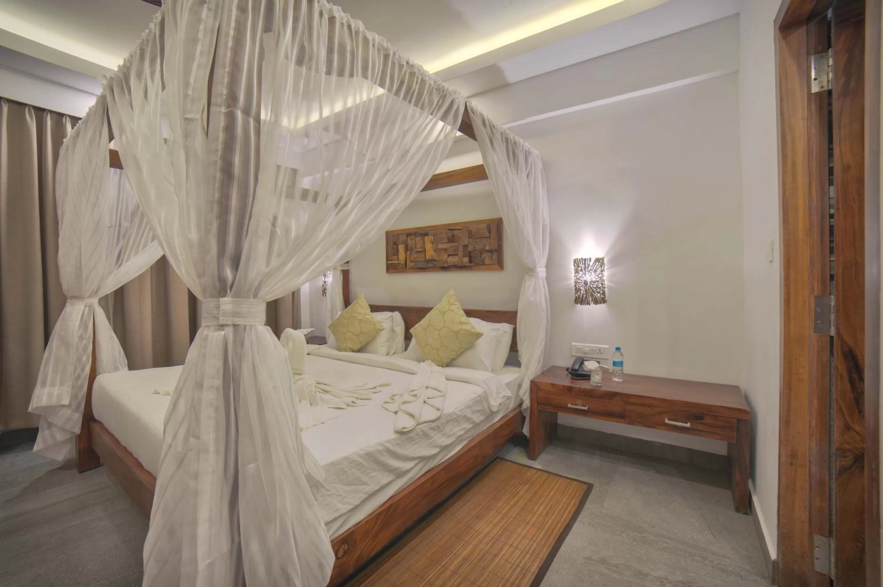Bed in Elixir Hills Suites Resort and Spa