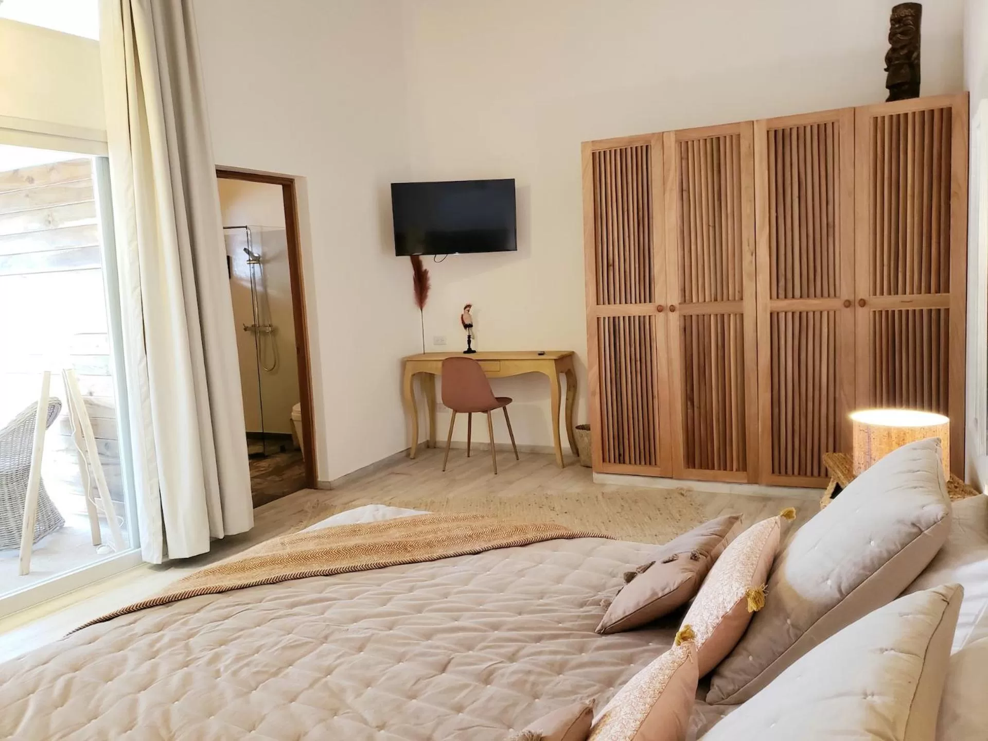 Bed in TAKUMA BOUTIK HOTEL