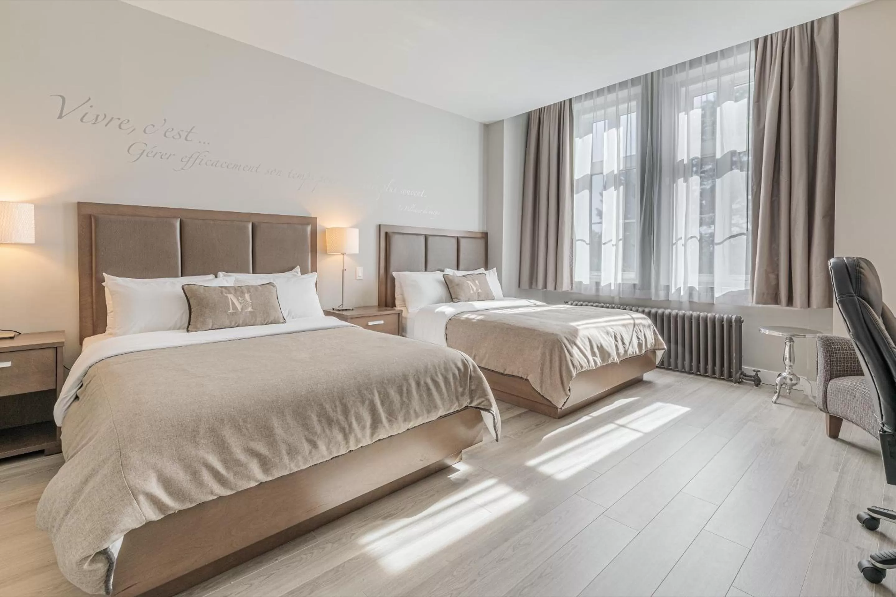 Bed in Hotel Montfort Nicolet