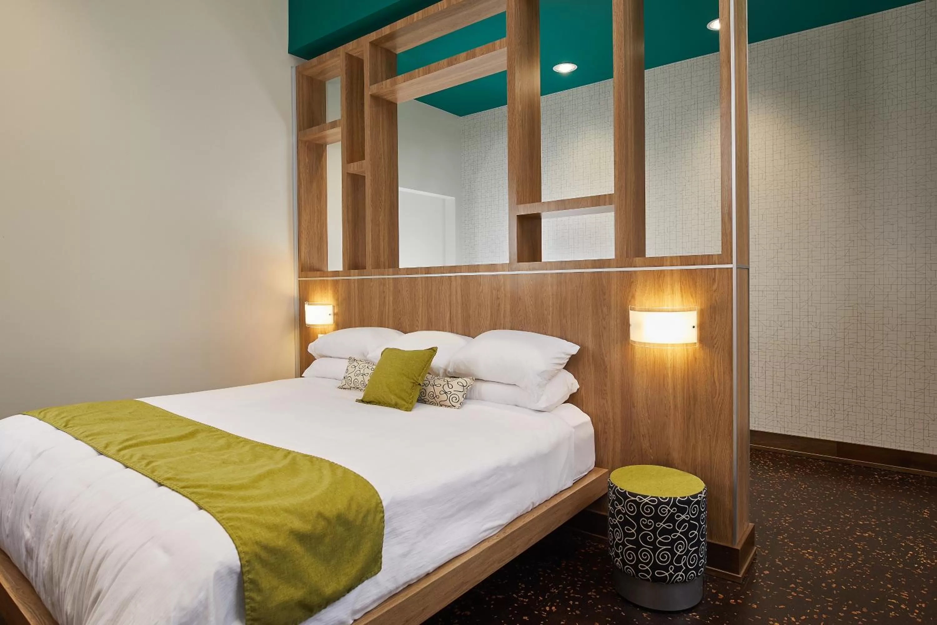 Bed in CityFlatsHotel - Grand Rapids, an Ascend Collection Hotel