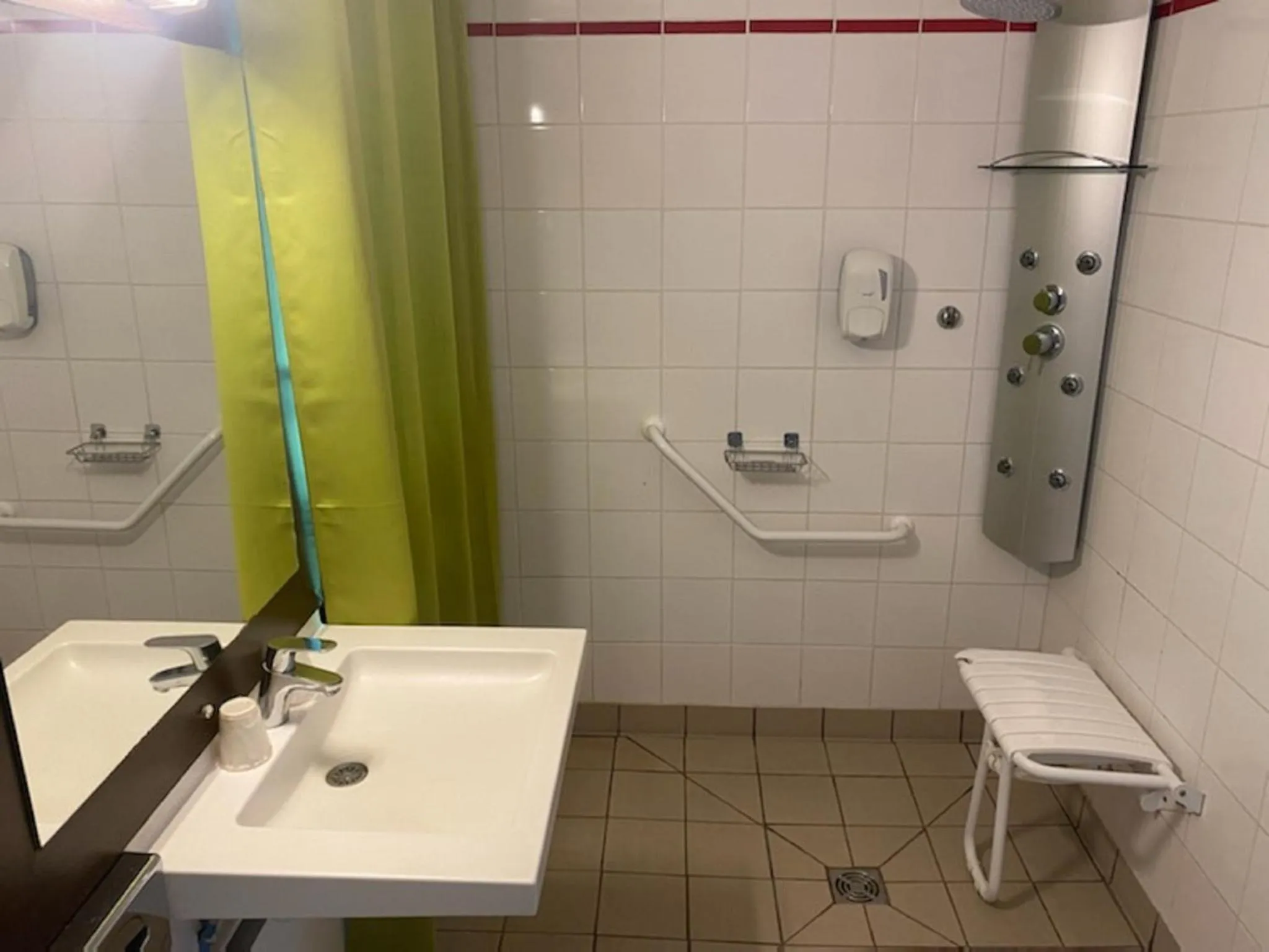 Shower in Enzo Hotels Vierzon by Kyriad Direct