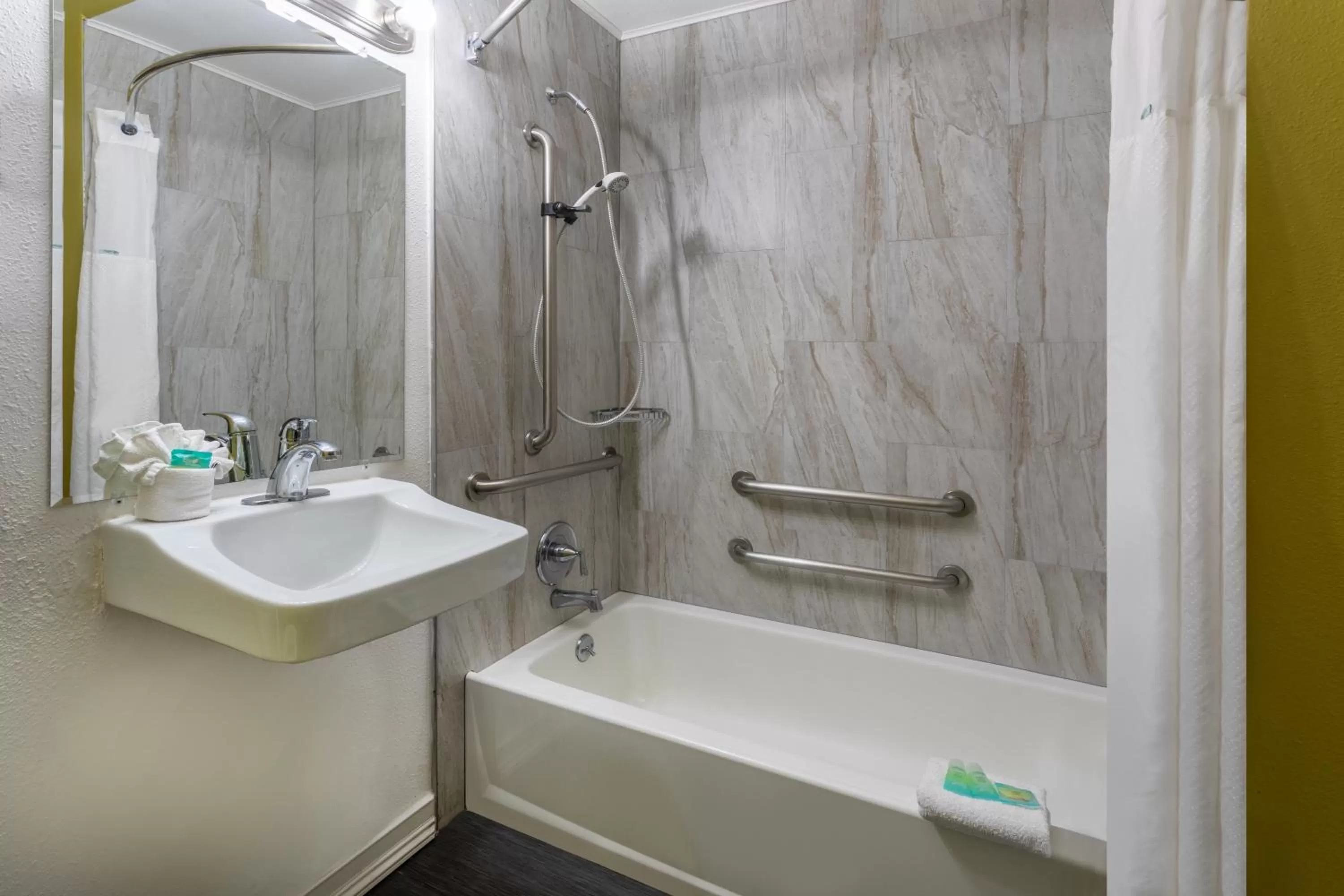 Bathroom in Super 8 by Wyndham NAU/Downtown Conference Center