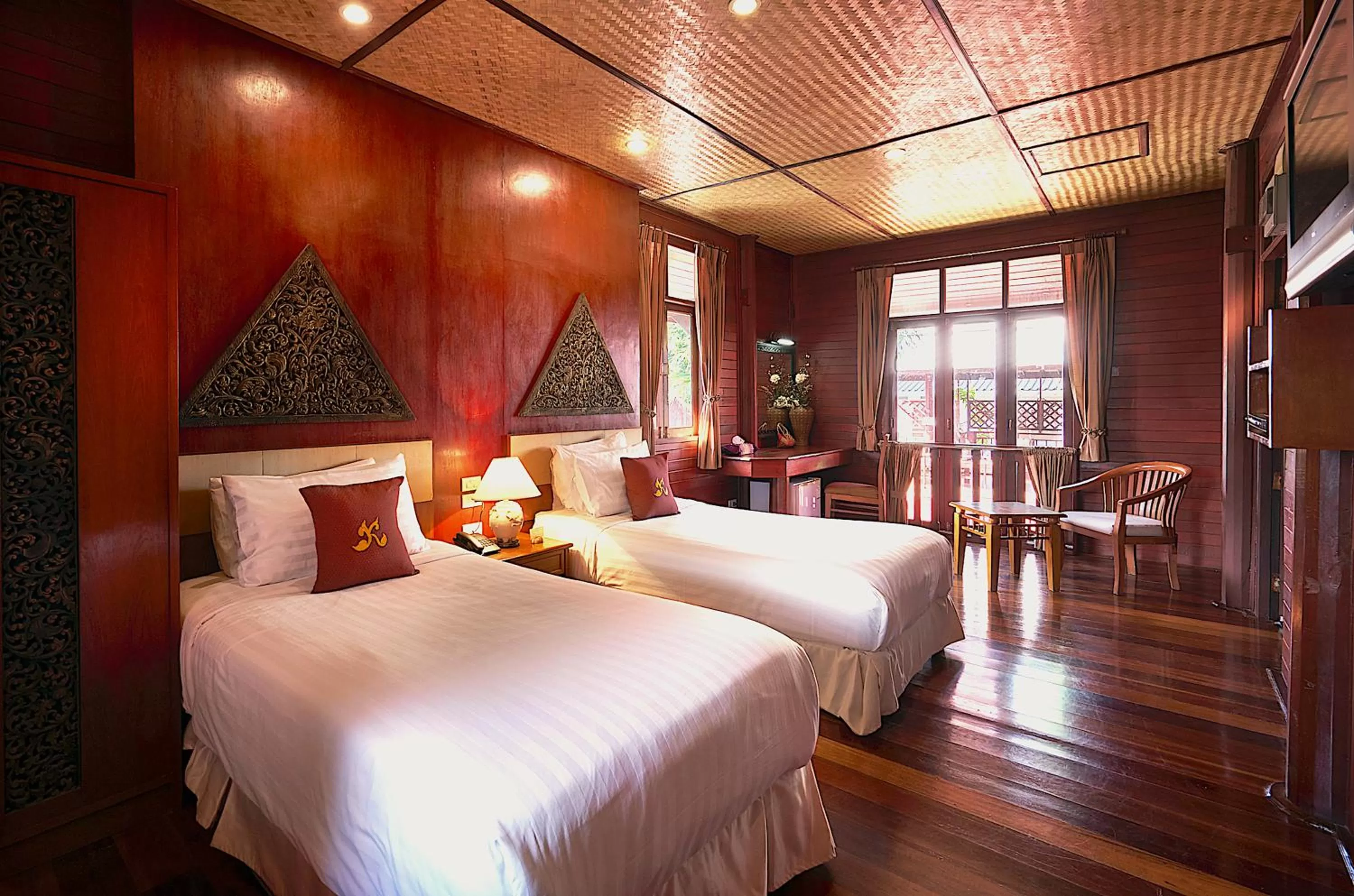 Bed in Ruenkanok Thaihouse Resort