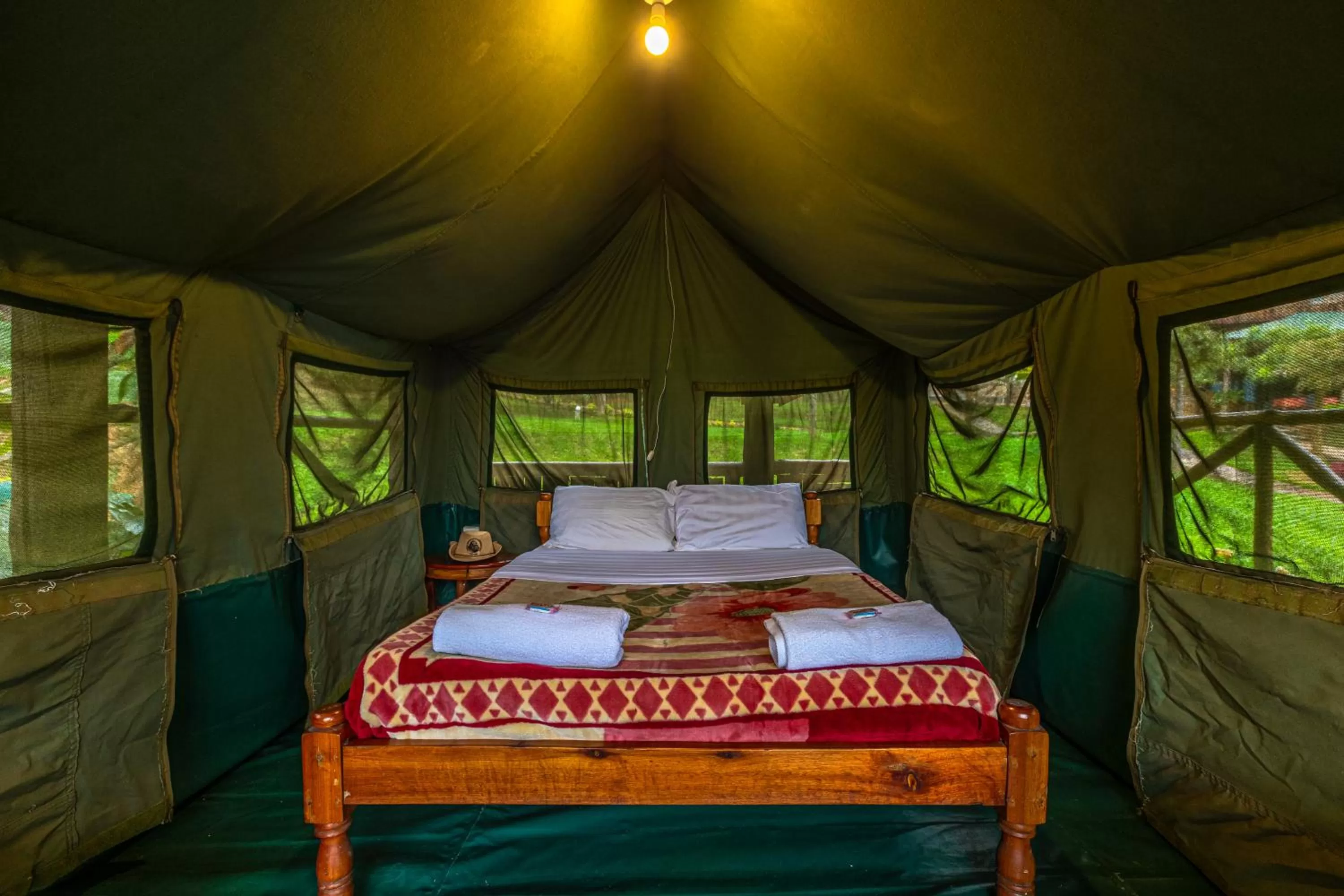 Bed in Bunyonyi Overland Resort