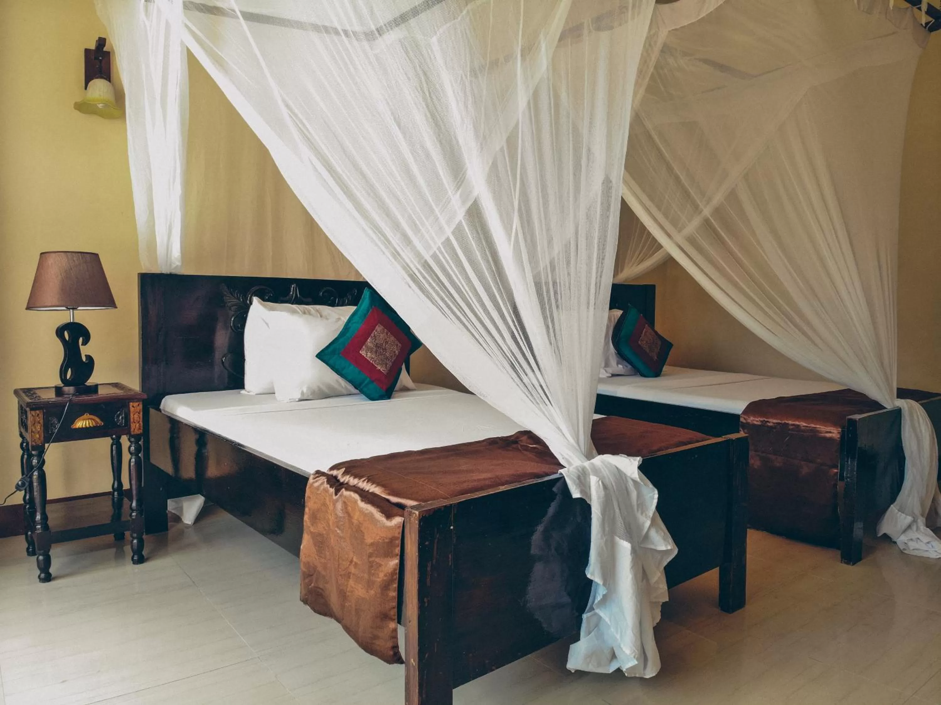 Bed in Amaan Beach Bungalows