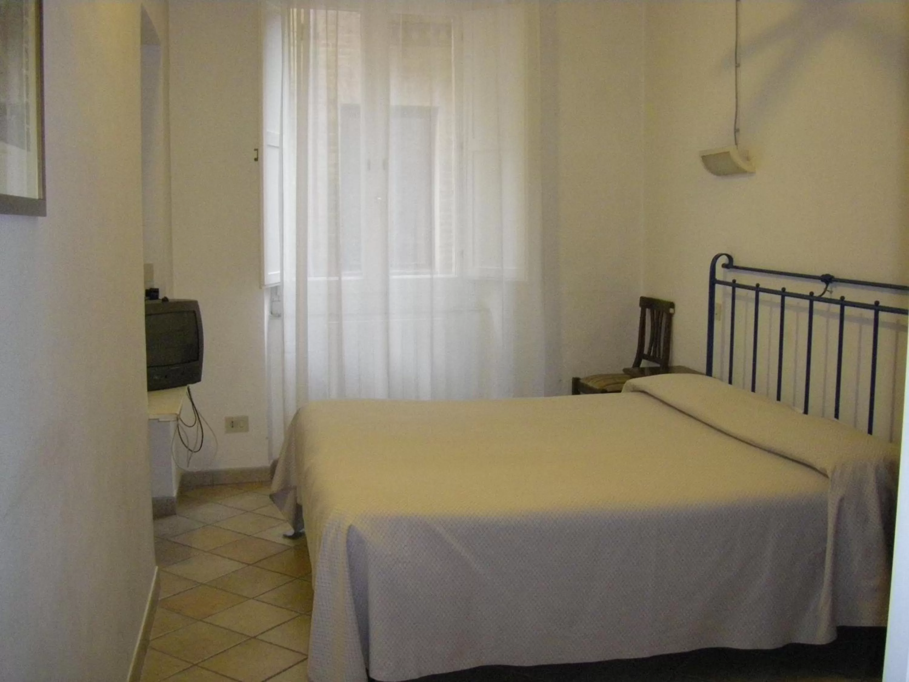Photo of the whole room, Bed in Albergo Cannon d'Oro