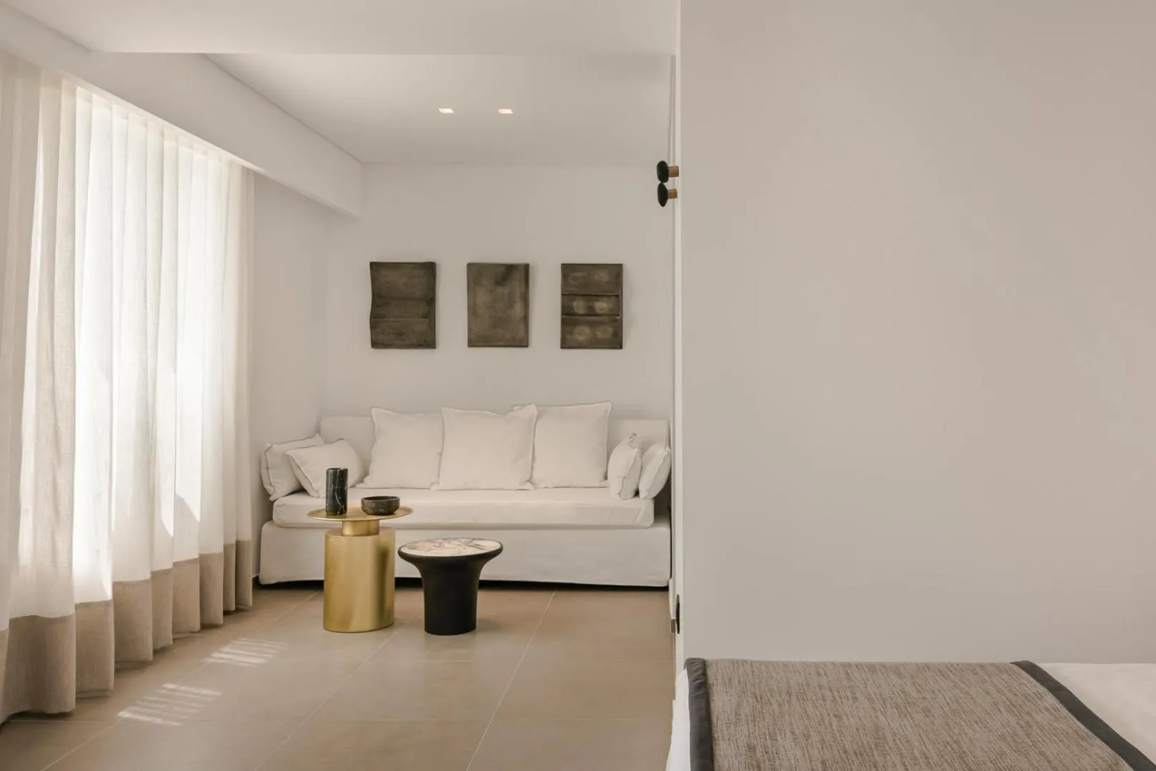 Seating area, Bed in Grace Mykonos