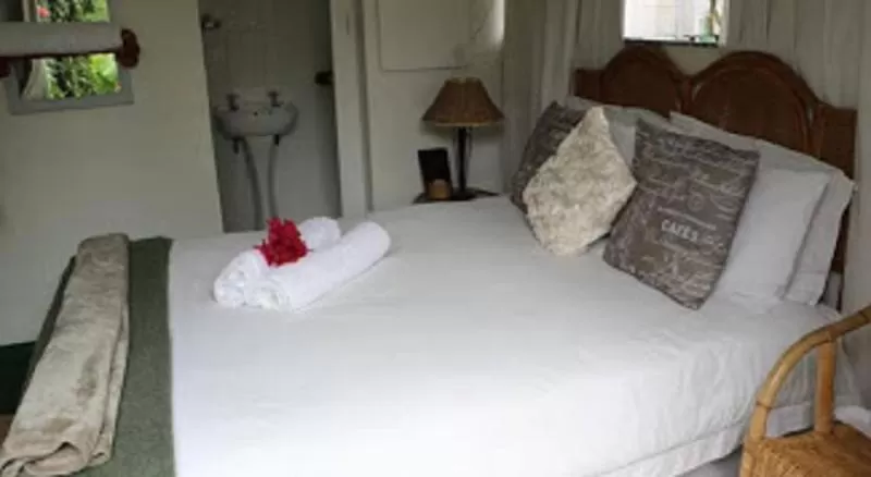 Bed in Forword's River Lodge