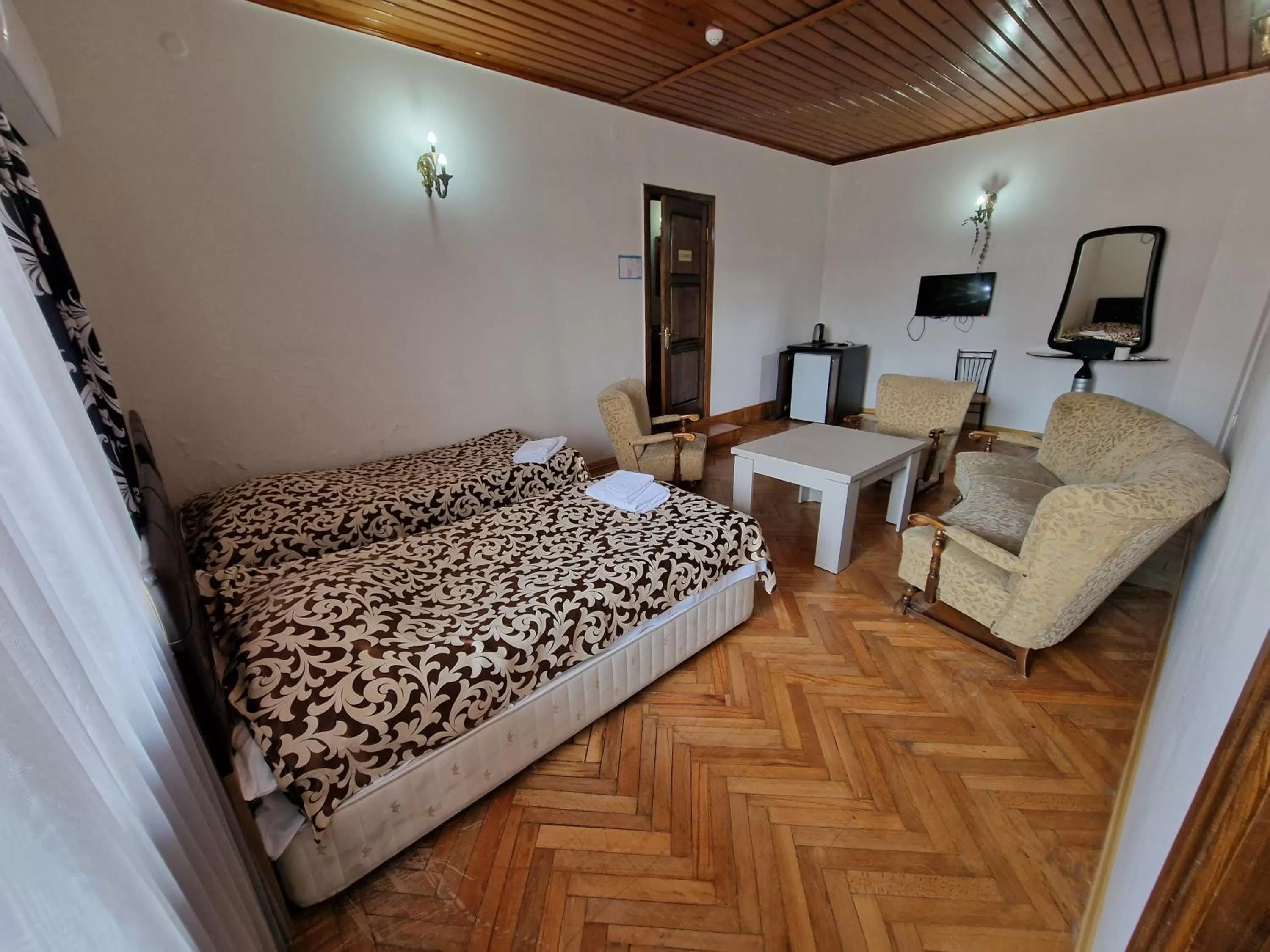 Photo of the whole room, Bed in CATTALEYA