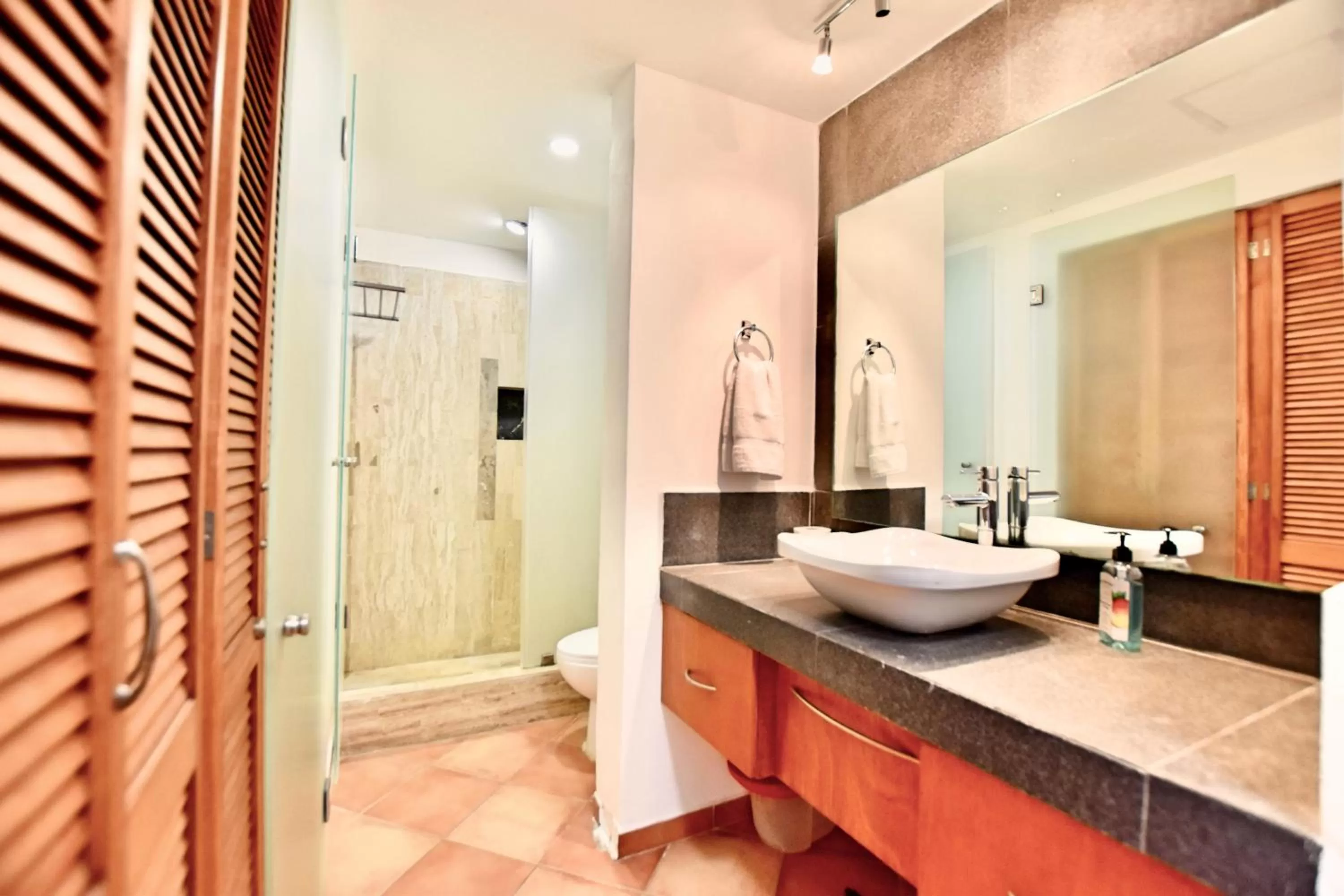 Shower in Solymar Condo Beach Resort by Casago