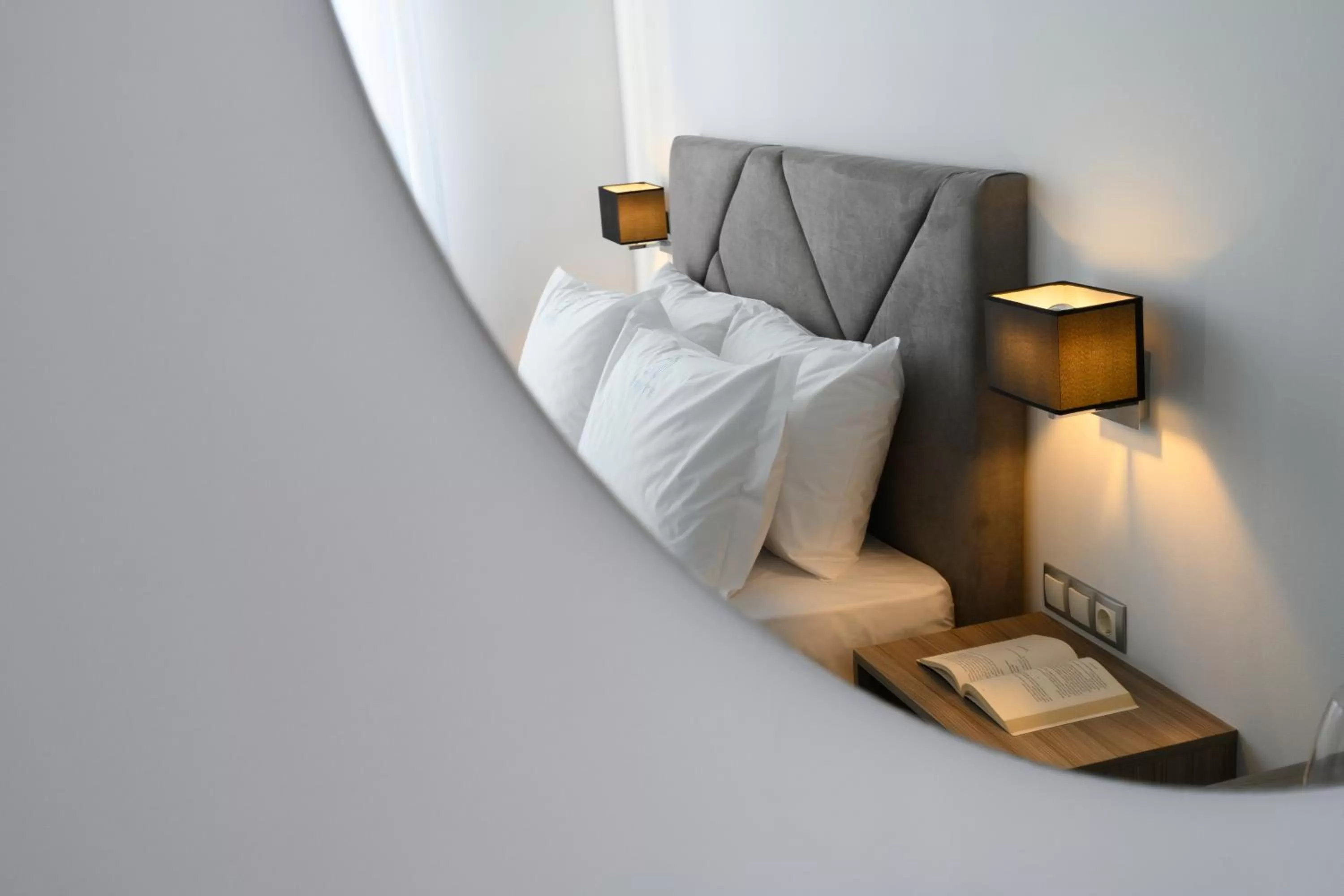 Bed in AMALPHI Corfu City Living