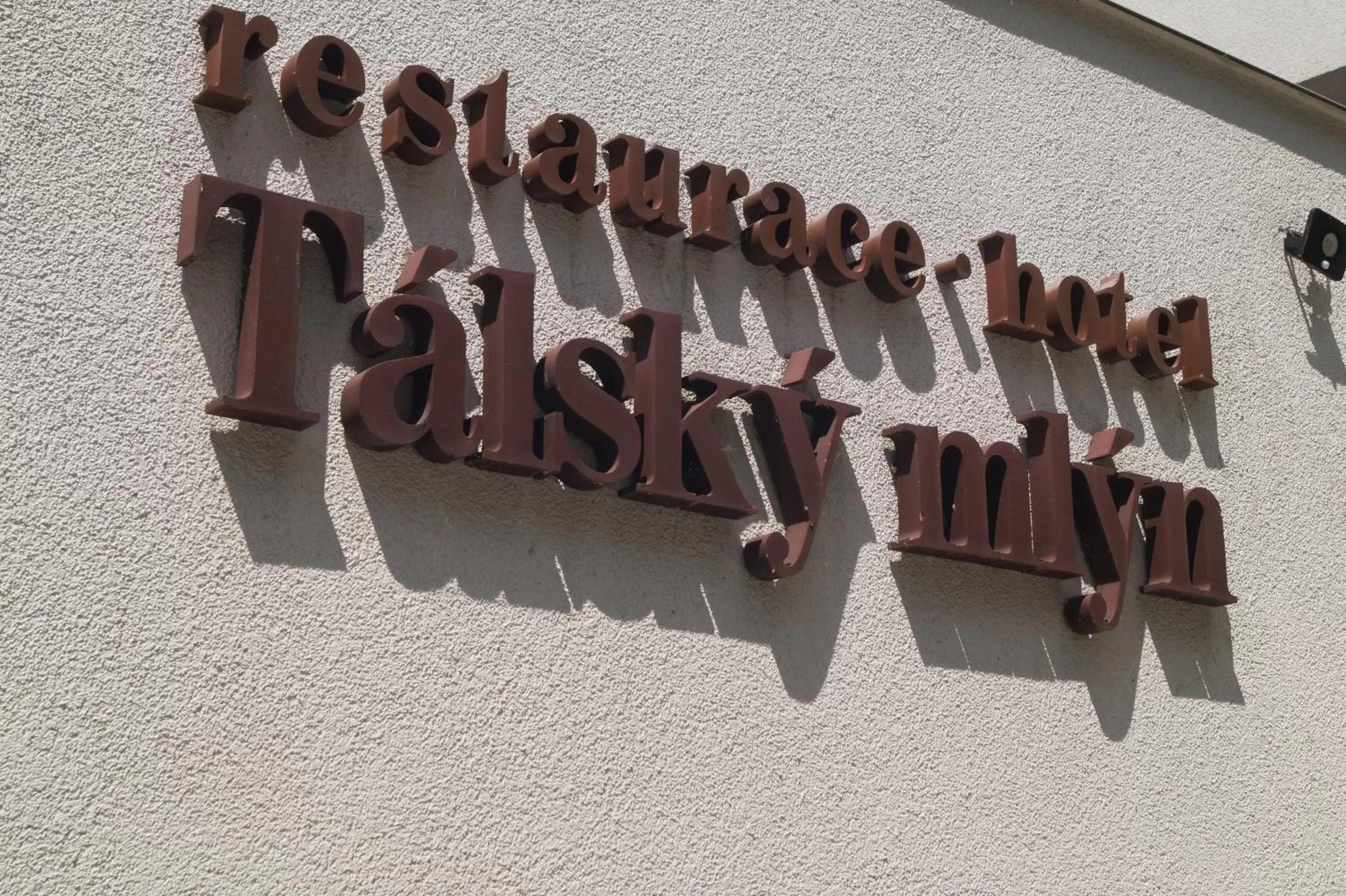 Property logo or sign in Hotel a Hostinec Tálský mlýn